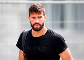 Brazil's goalkeeper Alisson leaves his team's hotel in Kazan on July 7, 2018, a day after the five-time champions crashed out of the Russia 2018 World Cup football tournament after a 2-1 quarter-final defeat to Belgium. (Photo by Benjamin CREMEL / AFP) (Photo credit should read BENJAMIN CREMEL/AFP/Getty Images)