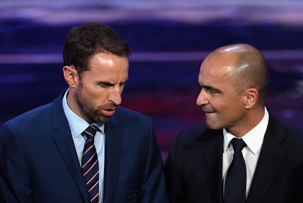 MOSCOW, RUSSIA - DECEMBER 01: Gareth Southgate, Manager of England speaks to Roberto Martinez, Manager of Belgium on the stage after the Final Draw for the 2018 FIFA World Cup Russia at the State Kremlin Palace on December 1, 2017 in Moscow, Russia. (Photo by Matthias Hangst/Bongarts/Getty Images)