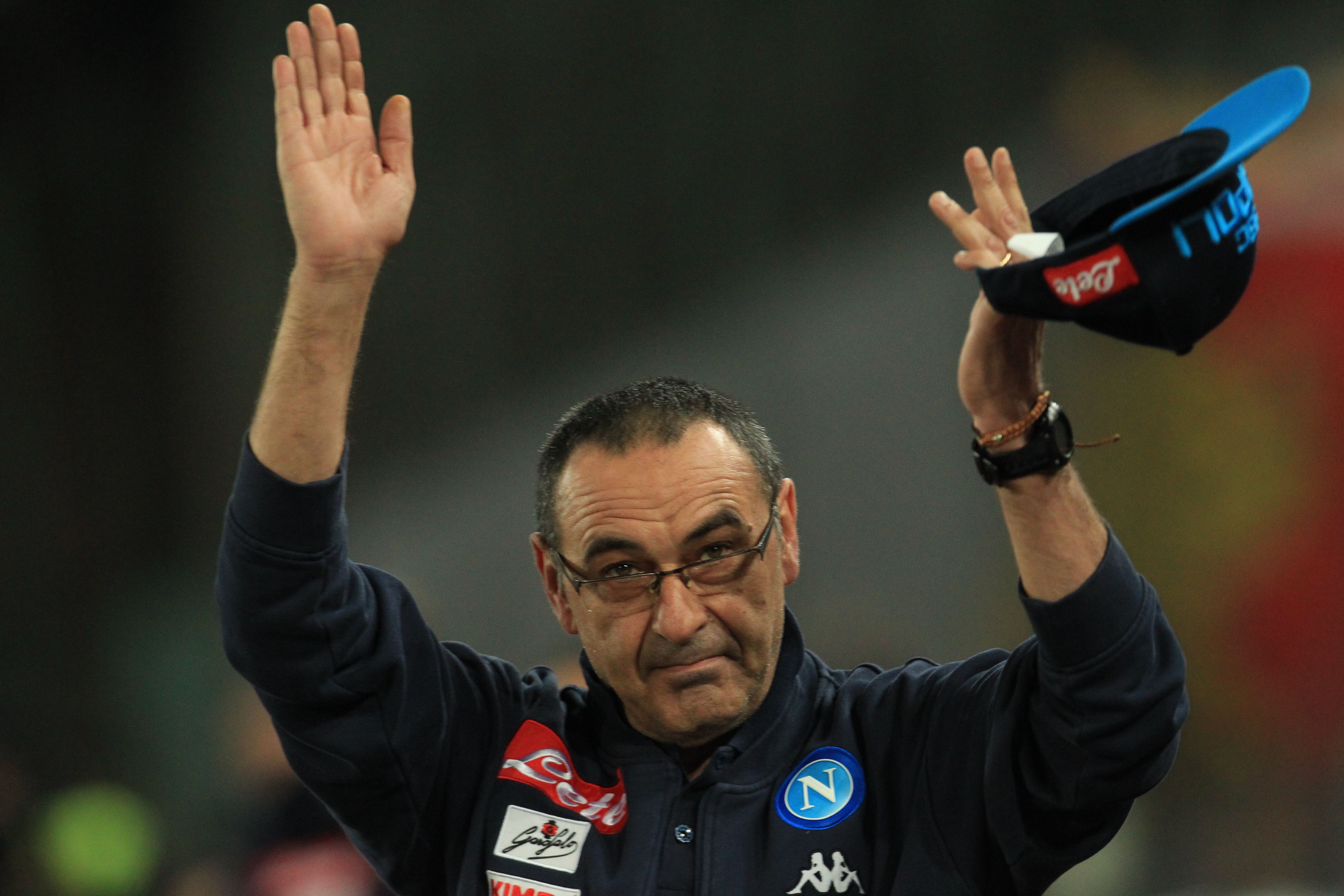 Napoli's coach Maurizio Sarri greets fans before the Italian Serie A football match SSC Napoli vs Genoa CFC on March 18, 2018 at the San Paolo Stadium. / AFP PHOTO / CARLO HERMANN        (Photo credit should read CARLO HERMANN/AFP/Getty Images)