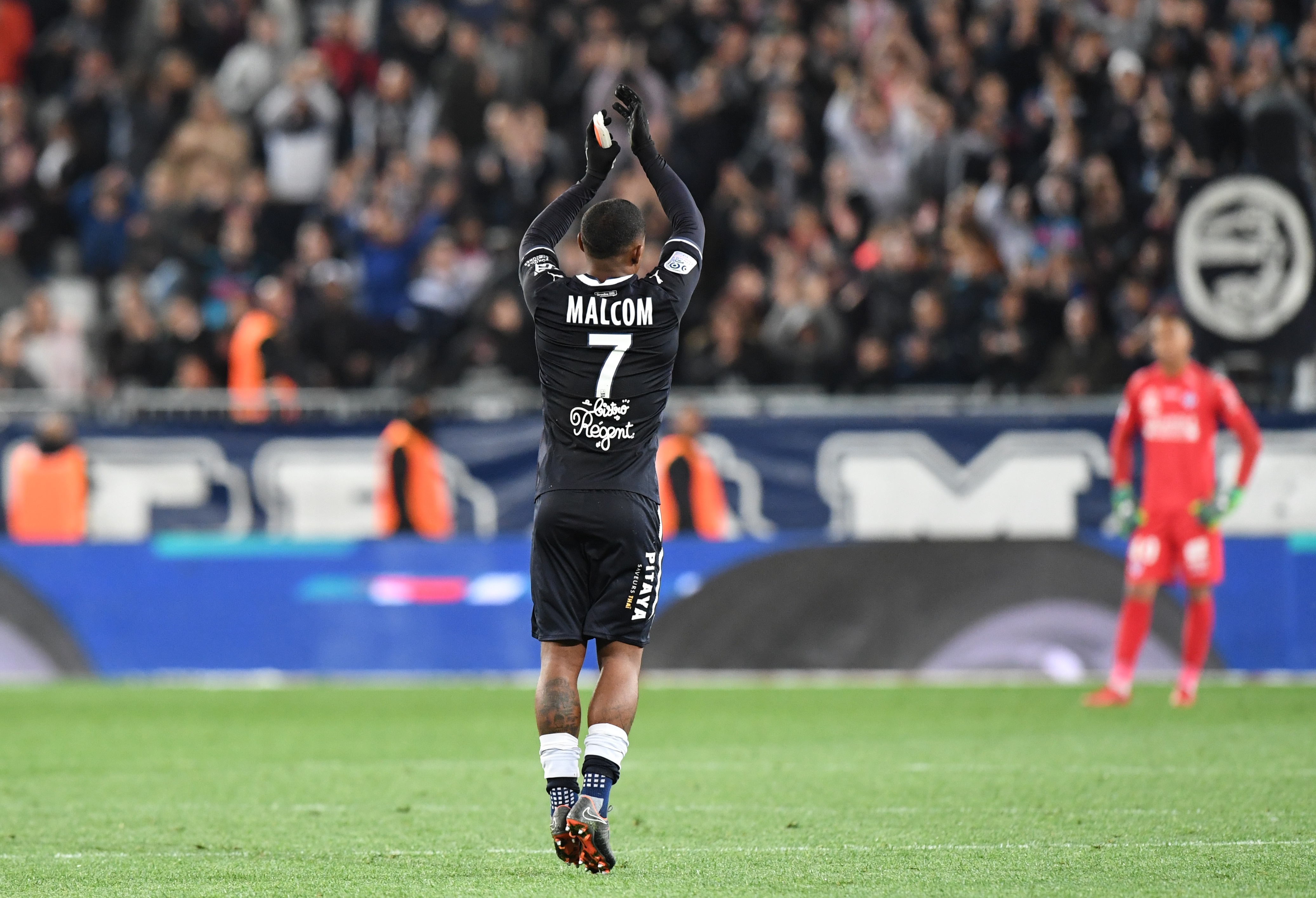 Bordeaux's player Malcom acknowledges the fans after scoring a goal during the French L1 football match Bordeaux vs Toulouse on May 12, 2018 at the Matmut Stadium in Bordeaux southwestern. - Malcom scored his last goal for Bordeaux before his departure next season. (Photo by MEHDI FEDOUACH / AFP)        (Photo credit should read MEHDI FEDOUACH/AFP/Getty Images)