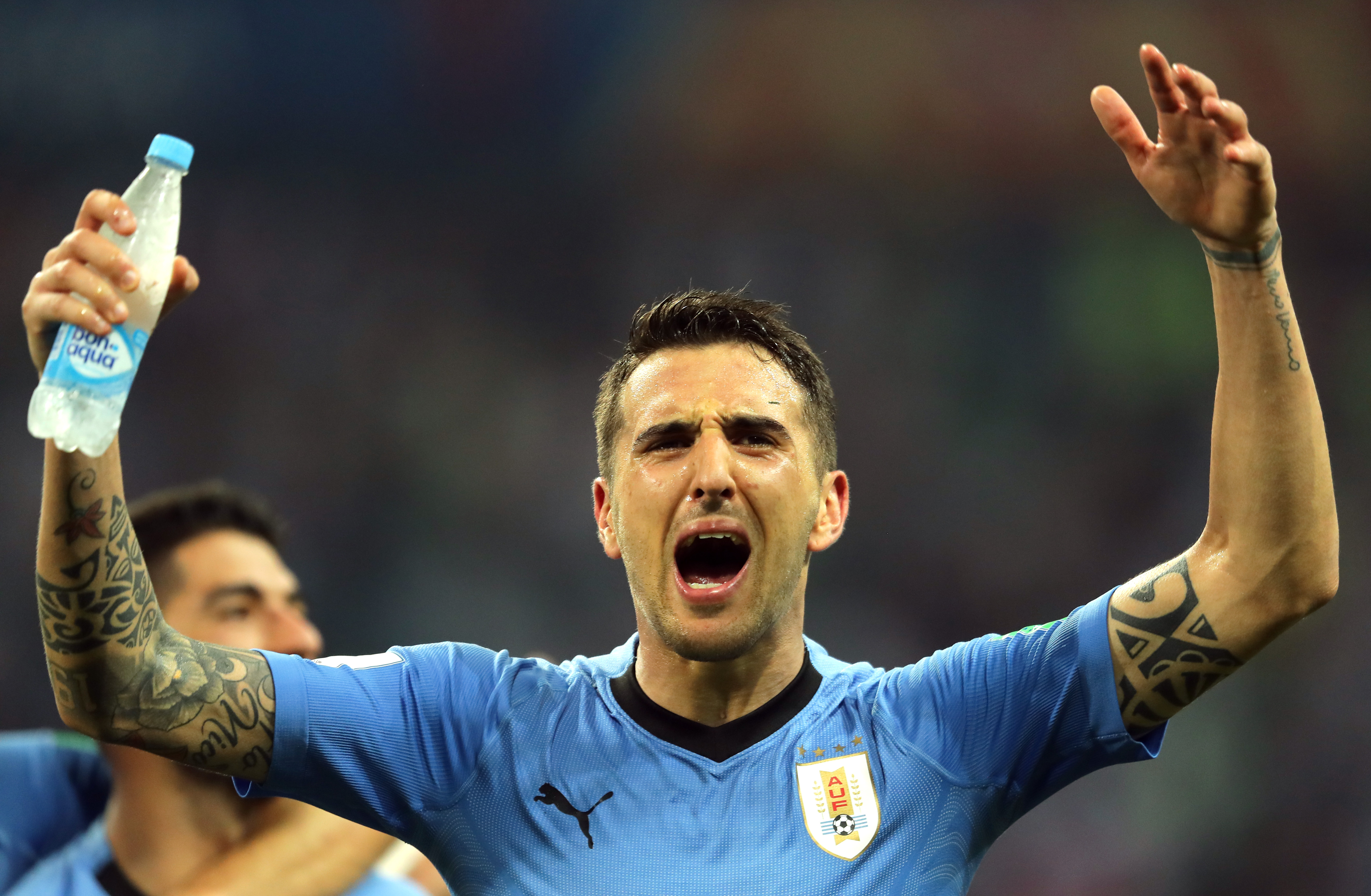 SOCHI, RUSSIA - JUNE 30:  Matias Vecino of Uruguay celebrates victory during the 2018 FIFA World Cup Russia Round of 16 match between Uruguay and Portugal at Fisht Stadium on June 30, 2018 in Sochi, Russia.  (Photo by Richard Heathcote/Getty Images)