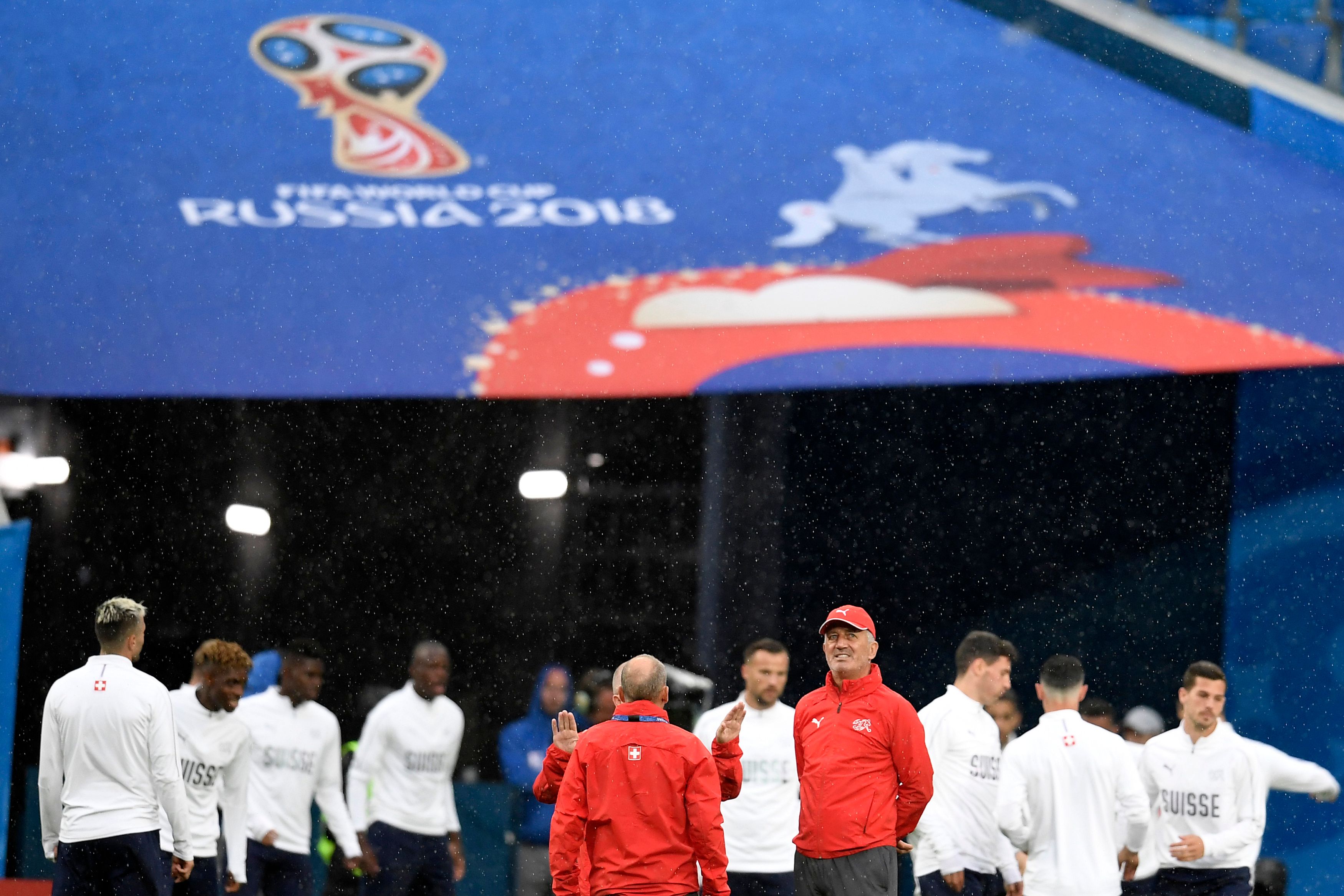 Switzerland's coach Vladimir Petkovic (4thR) stands past his players during a training session at the Saint Petersburg Stadium in Saint Petersburg on July 2, 2018 on the eve of the Russia 2018 World Cup round of 16 football match between Sweden and Switzerland. (Photo by GABRIEL BOUYS / AFP)        (Photo credit should read GABRIEL BOUYS/AFP/Getty Images)