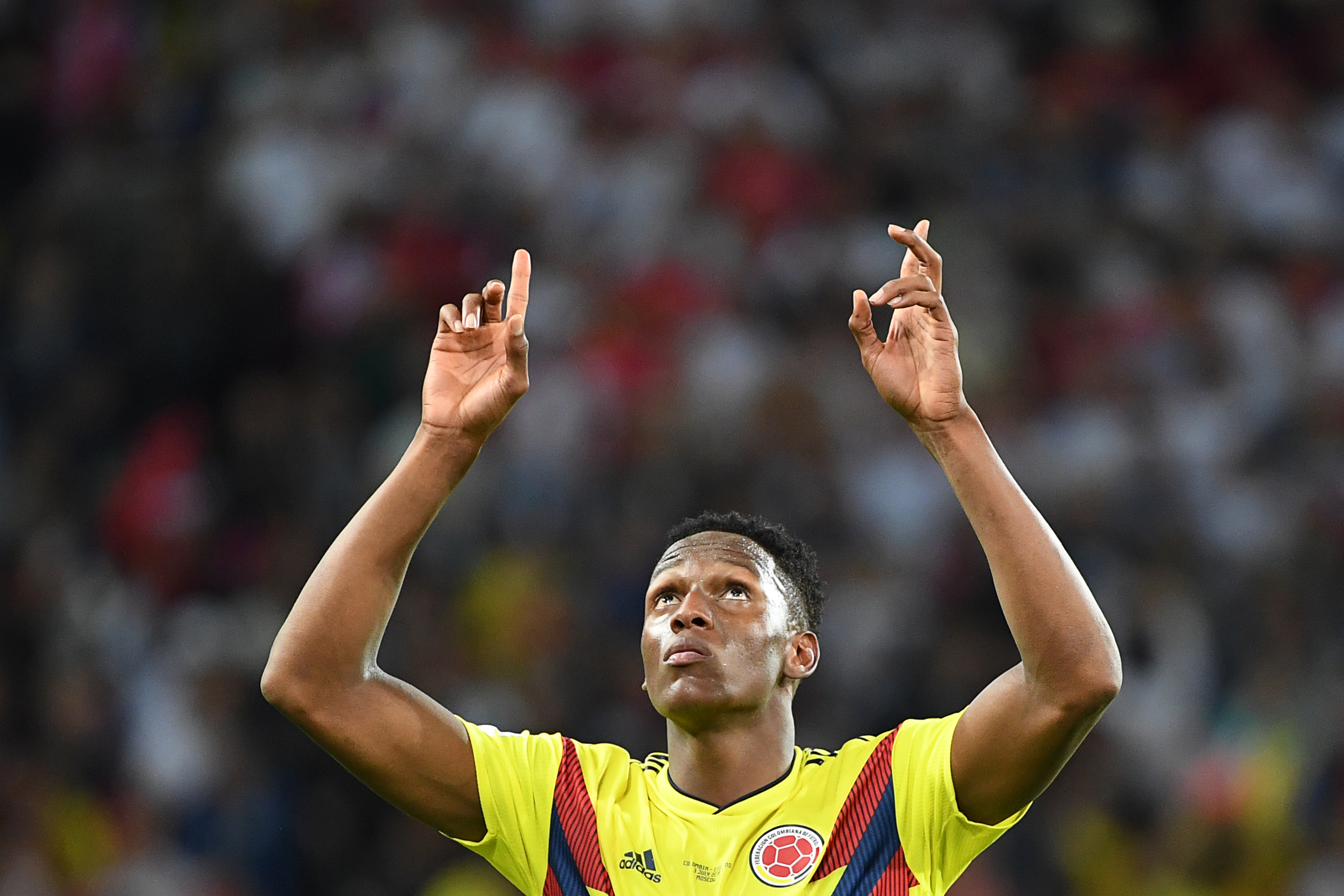 Colombia's defender Yerry Mina celebrates after scoring the equalizer during the Russia 2018 World Cup round of 16 football match between Colombia and England at the Spartak Stadium in Moscow on July 3, 2018. (Photo by YURI CORTEZ / AFP) / RESTRICTED TO EDITORIAL USE - NO MOBILE PUSH ALERTS/DOWNLOADS        (Photo credit should read YURI CORTEZ/AFP/Getty Images)