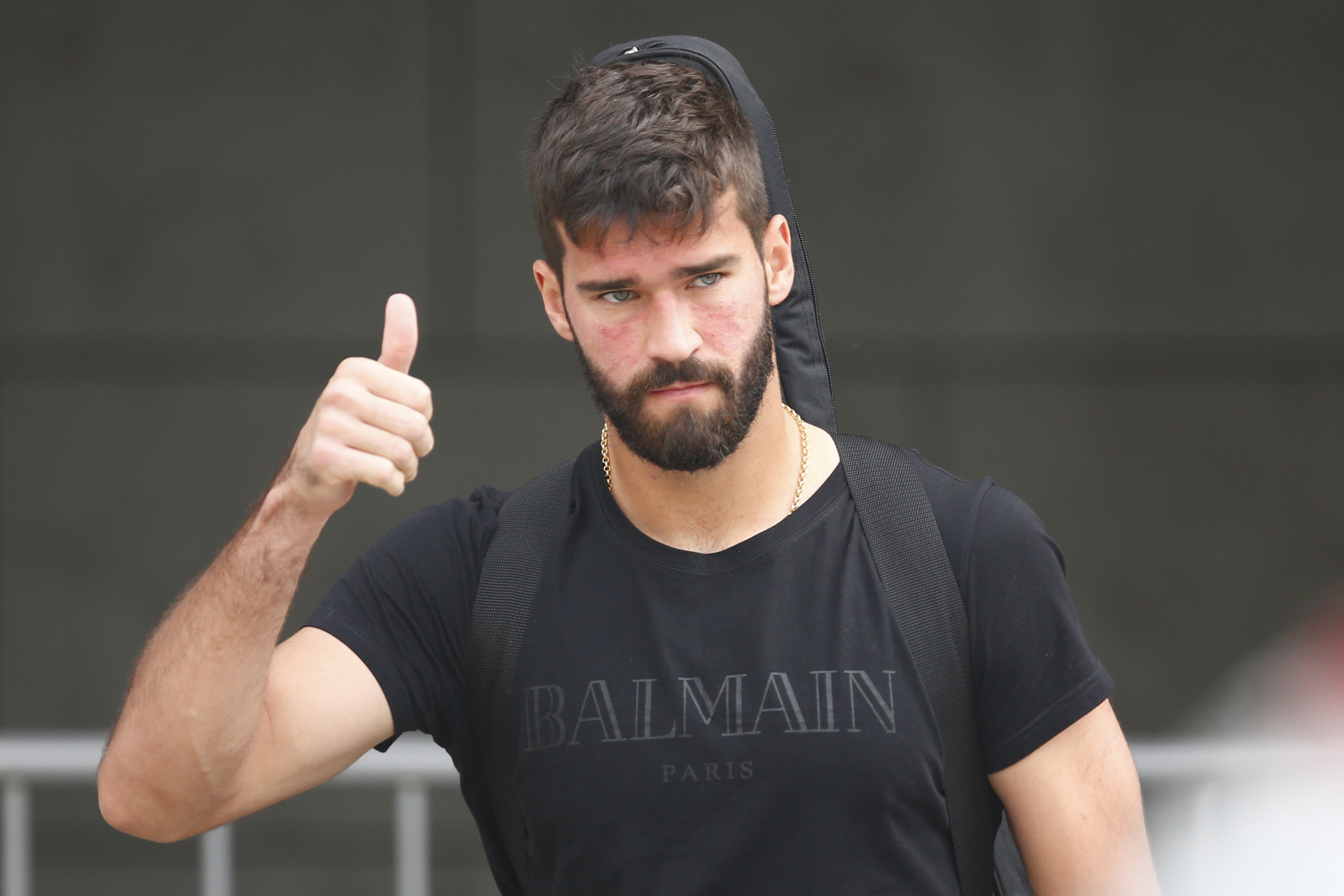 Brazil's goalkeeper Alisson leaves his team's hotel in Kazan on July 7, 2018, a day after the five-time champions crashed out of the Russia 2018 World Cup football tournament after a 2-1 quarter-final defeat to Belgium. (Photo by Benjamin CREMEL / AFP)        (Photo credit should read BENJAMIN CREMEL/AFP/Getty Images)