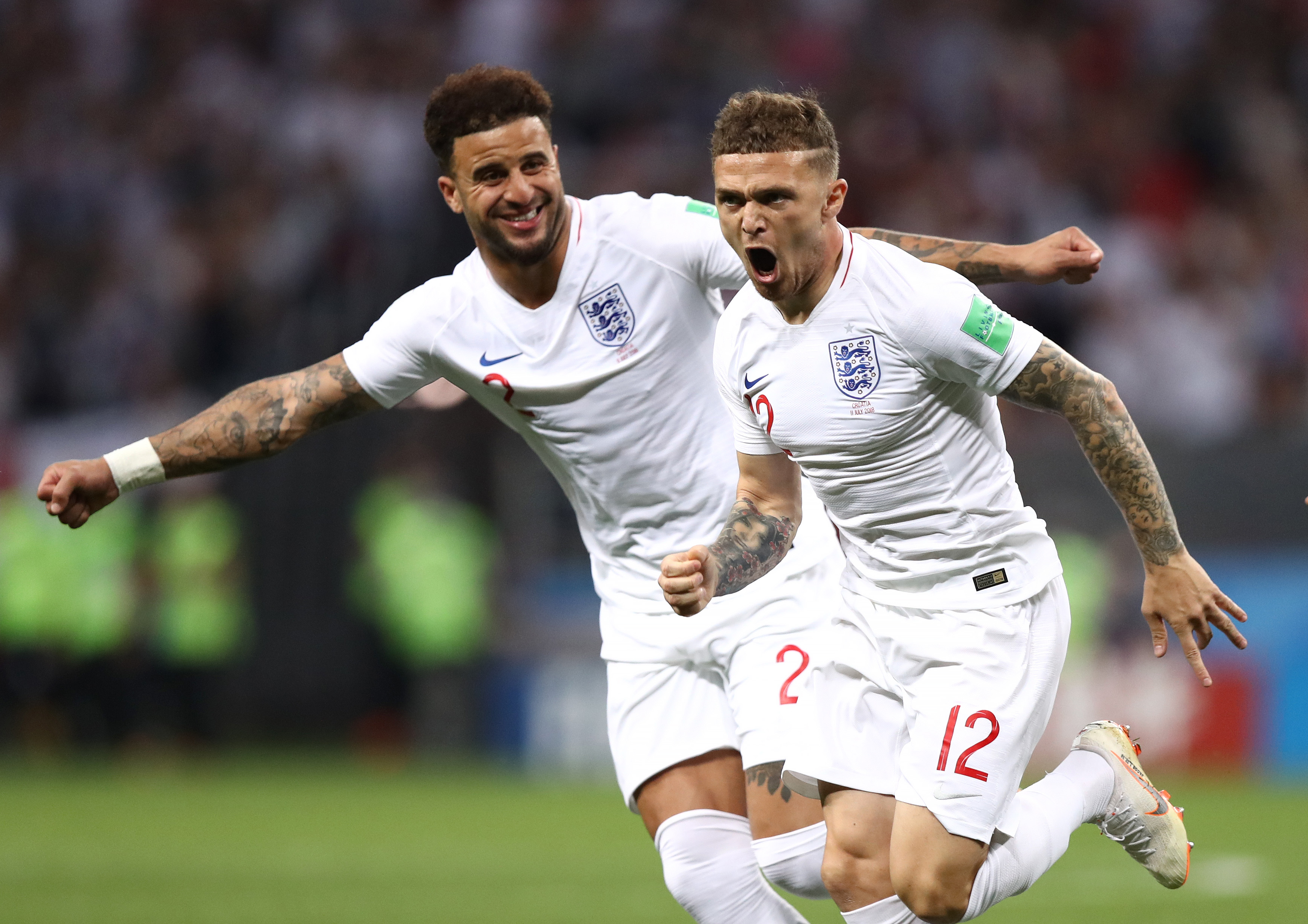 MOSCOW, RUSSIA - JULY 11:  Kieran Trippier of England celebrates with team mate Kyle Walker after scoring his team's first goal  during the 2018 FIFA World Cup Russia Semi Final match between England and Croatia at Luzhniki Stadium on July 11, 2018 in Moscow, Russia.  (Photo by Ryan Pierse/Getty Images)