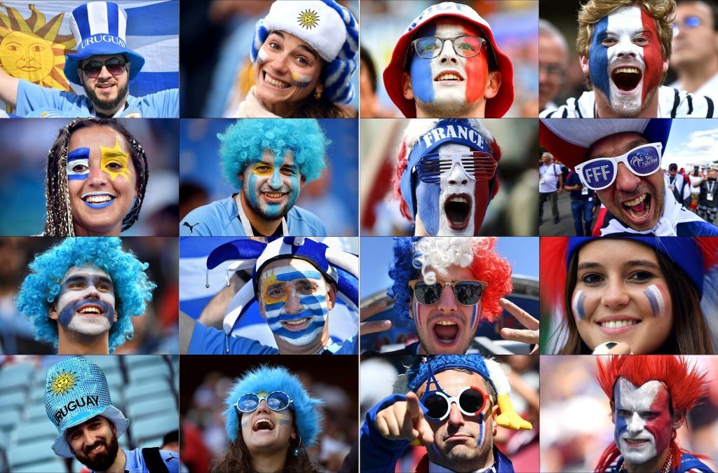 TOPSHOT - (COMBO) This combination of photos created on July 4, 2018 shows fans of Uruguay (L) and France supporting their team during the Russia 2018 World Cup football tournament. - France will play Uruguay in their the Russia 2018 World Cup quarter-final football match at the Nizhny Novgorod Stadium in Nizhny Novgorod on July 6, 2018. (Photo by - / AFP) (Photo credit should read -/AFP/Getty Images)