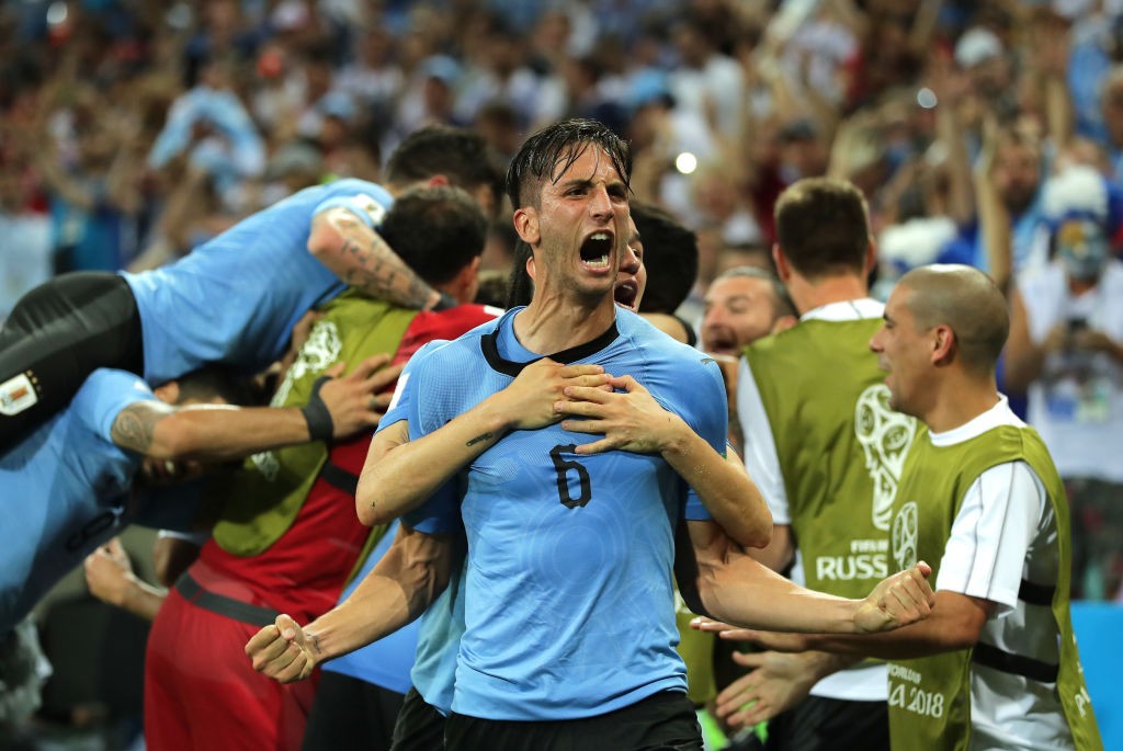 SOCHI, RUSSIA - JUNE 30: Rodrigo Bentancur of Uruguay celebrates after teammate Edinson Cavani scores their team's second goal during the 2018 FIFA World Cup Russia Round of 16 match between Uruguay and Portugal at Fisht Stadium on June 30, 2018 in Sochi, Russia. (Photo by Richard Heathcote/Getty Images)