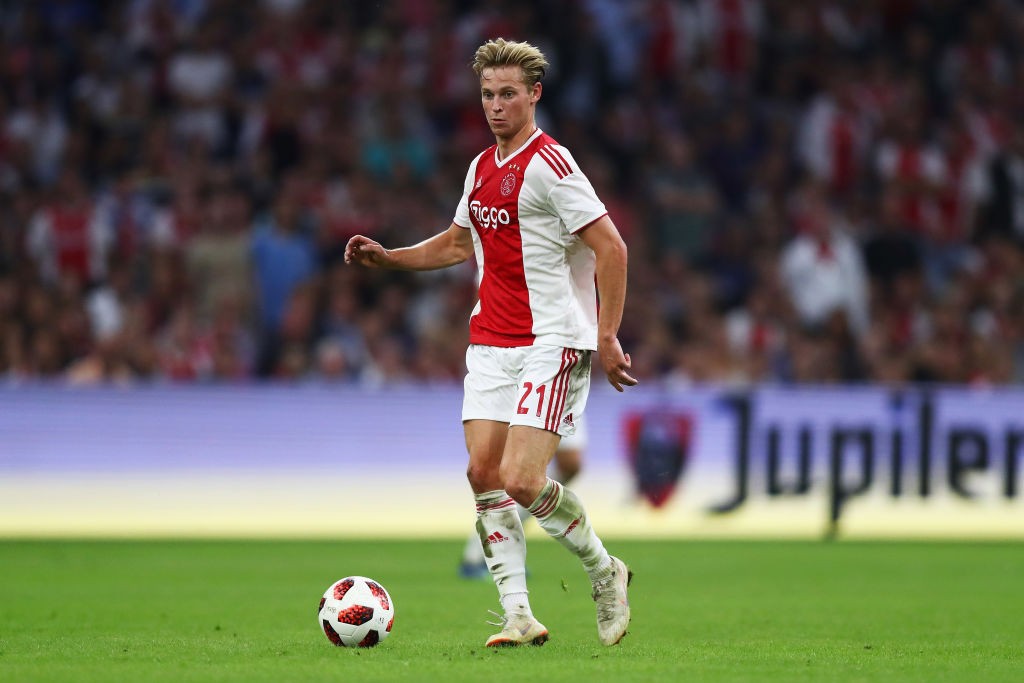 AMSTERDAM, NETHERLANDS - AUGUST 14: Frenkie de Jong of Ajax in action during the UEFA Champions League third round qualifying match between Ajax and Royal Standard de Liege at Johan Cruyff Arena on August 14, 2018 in Amsterdam, Netherlands. (Photo by Dean Mouhtaropoulos/Getty Images)