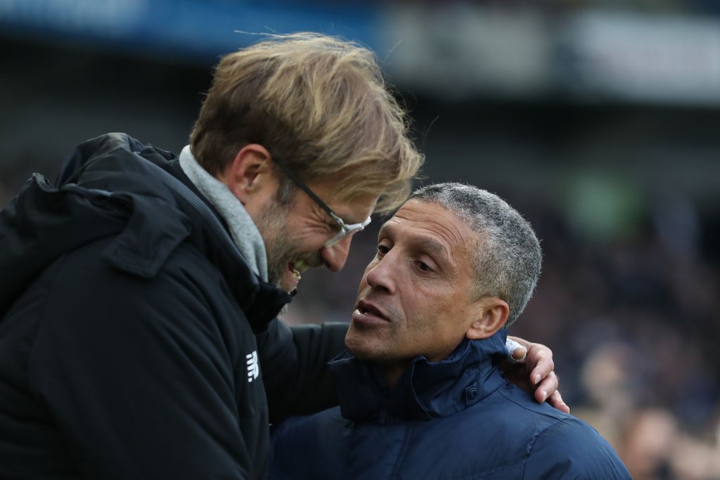 BRIGHTON, ENGLAND - DECEMBER 02: Jurgen Klopp, Manager of Liverpool and Chris Hughton, Manager of Brighton and Hove Albion during the Premier League match between Brighton and Hove Albion and Liverpool at Amex Stadium on December 2, 2017 in Brighton, England. (Photo by Dan Istitene/Getty Images)