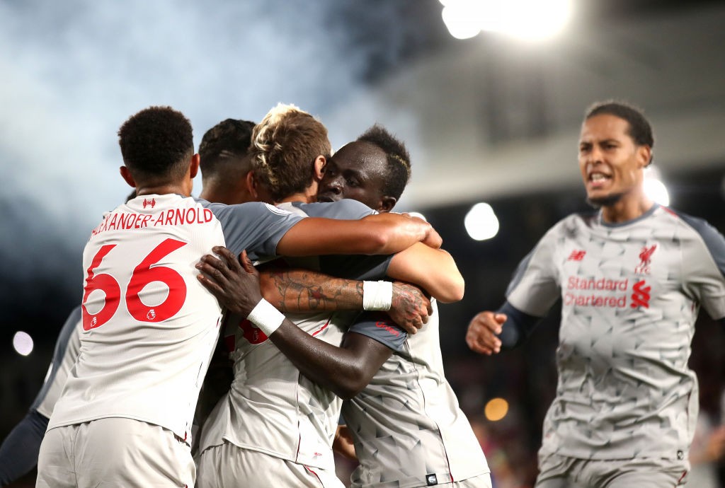 LONDON, ENGLAND - AUGUST 20: Sadio Mane of Liverpool celebrates after scoring his team's second goal with team mates during the Premier League match between Crystal Palace and Liverpool FC at Selhurst Park on August 20, 2018 in London, United Kingdom. (Photo by Julian Finney/Getty Images)