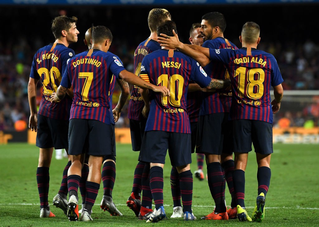 BARCELONA, SPAIN - AUGUST 18: Lionel Messi of FC Barcelona celebrates with his teams after scoring his team's third goal during the La Liga match between FC Barcelona and Deportivo Alaves at Camp Nou on August 18, 2018 in Barcelona, Spain. (Photo by David Ramos/Getty Images)