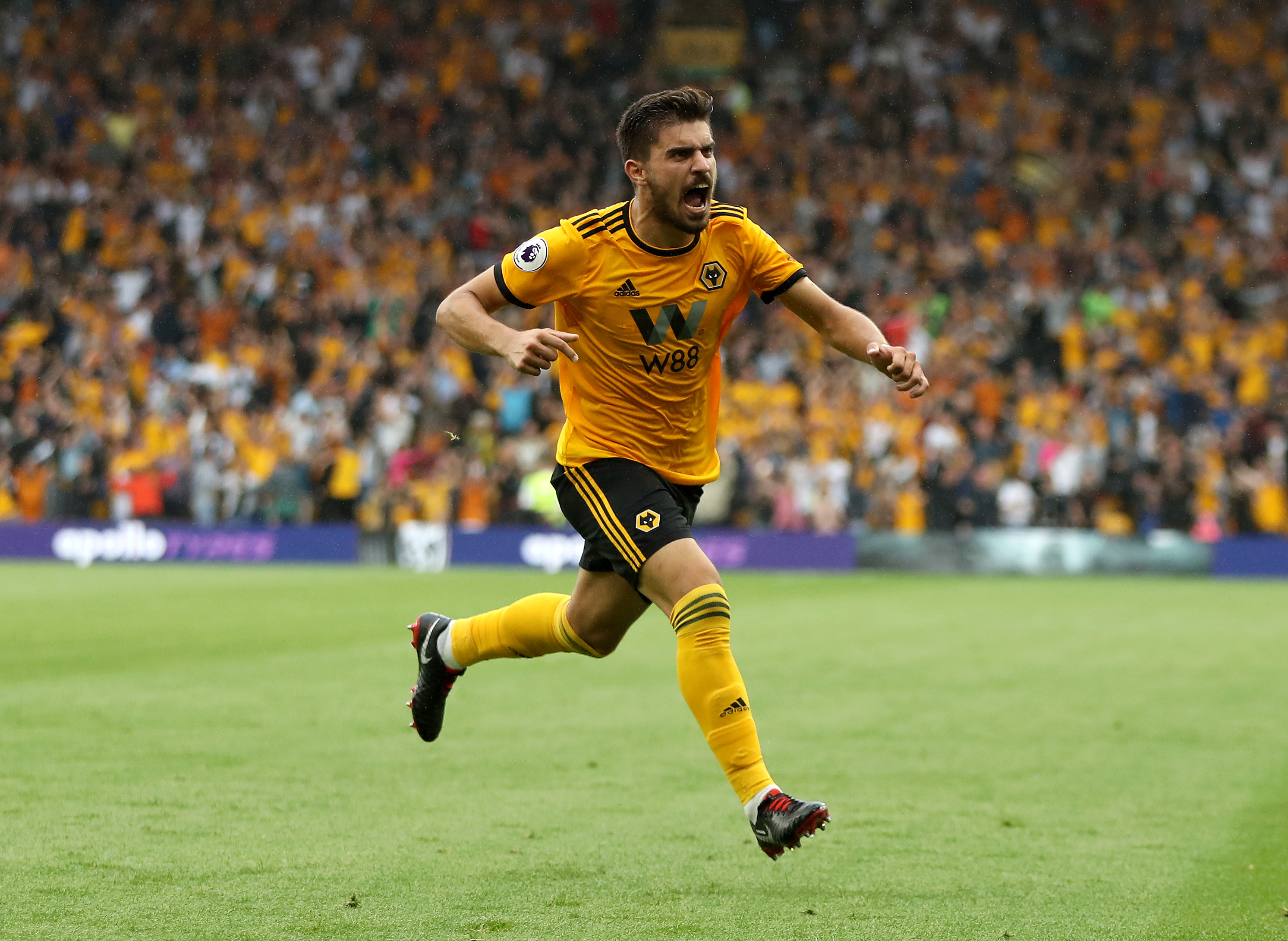 WOLVERHAMPTON, ENGLAND - AUGUST 11:  Ruben Neves of Wolverhampton Wanderers celebrates after scoring his team's first goal during the Premier League match between Wolverhampton Wanderers and Everton FC at Molineux on August 11, 2018 in Wolverhampton, United Kingdom.  (Photo by David Rogers/Getty Images)
