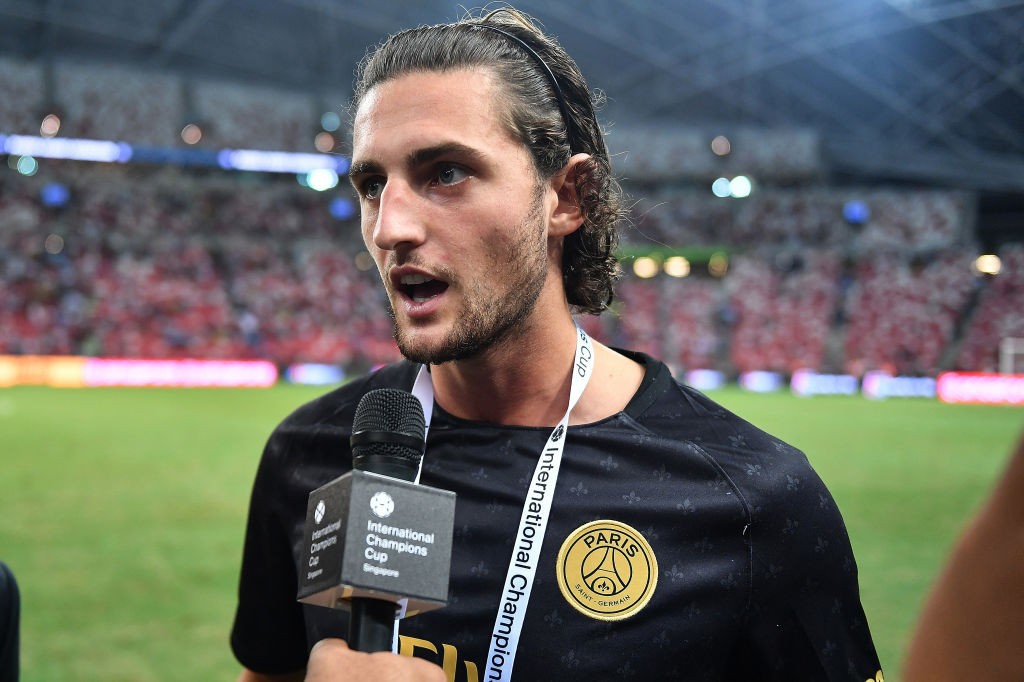 SINGAPORE - JULY 30: Adrien Rabiot #25 of Paris Saint Germain interviews during the International Champions Cup match between Paris Saint Germain and Clu b de Atletico Madrid at the National Stadium on July 30, 2018 in Singapore. (Photo by Thananuwat Srirasant/Getty Images for ICC)