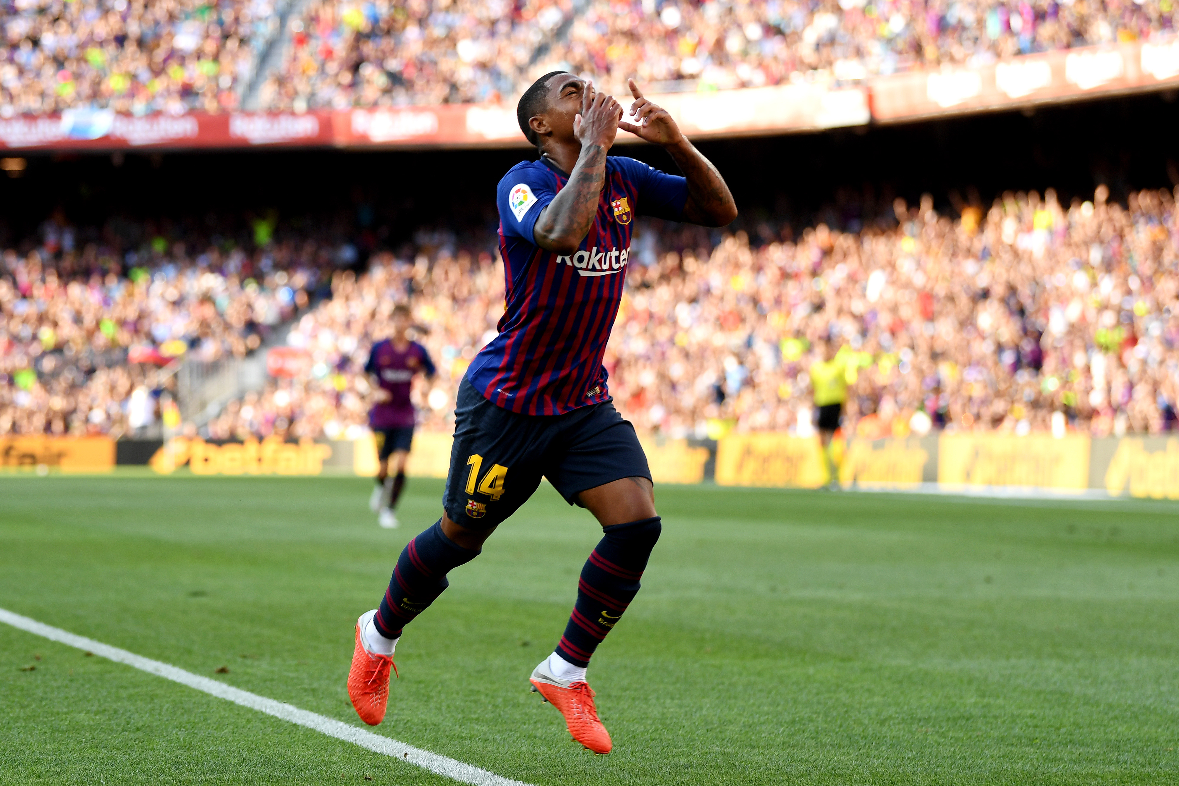 BARCELONA, SPAIN - AUGUST 15:  Malcom of Barcelona celebrates scoring his sides first goal during the Joan Gamper Trophy between FC Barcelona and Boca Juniors at Camp Nou on August 15, 2018 in Barcelona, Spain.  (Photo by David Ramos/Getty Images)