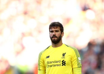 LIVERPOOL, ENGLAND - AUGUST 25:  Alisson Becker of Liverpool looks on during the Premier League match between Liverpool FC and Brighton & Hove Albion at Anfield on August 25, 2018 in Liverpool, United Kingdom. (Photo by Jan Kruger/Getty Images)