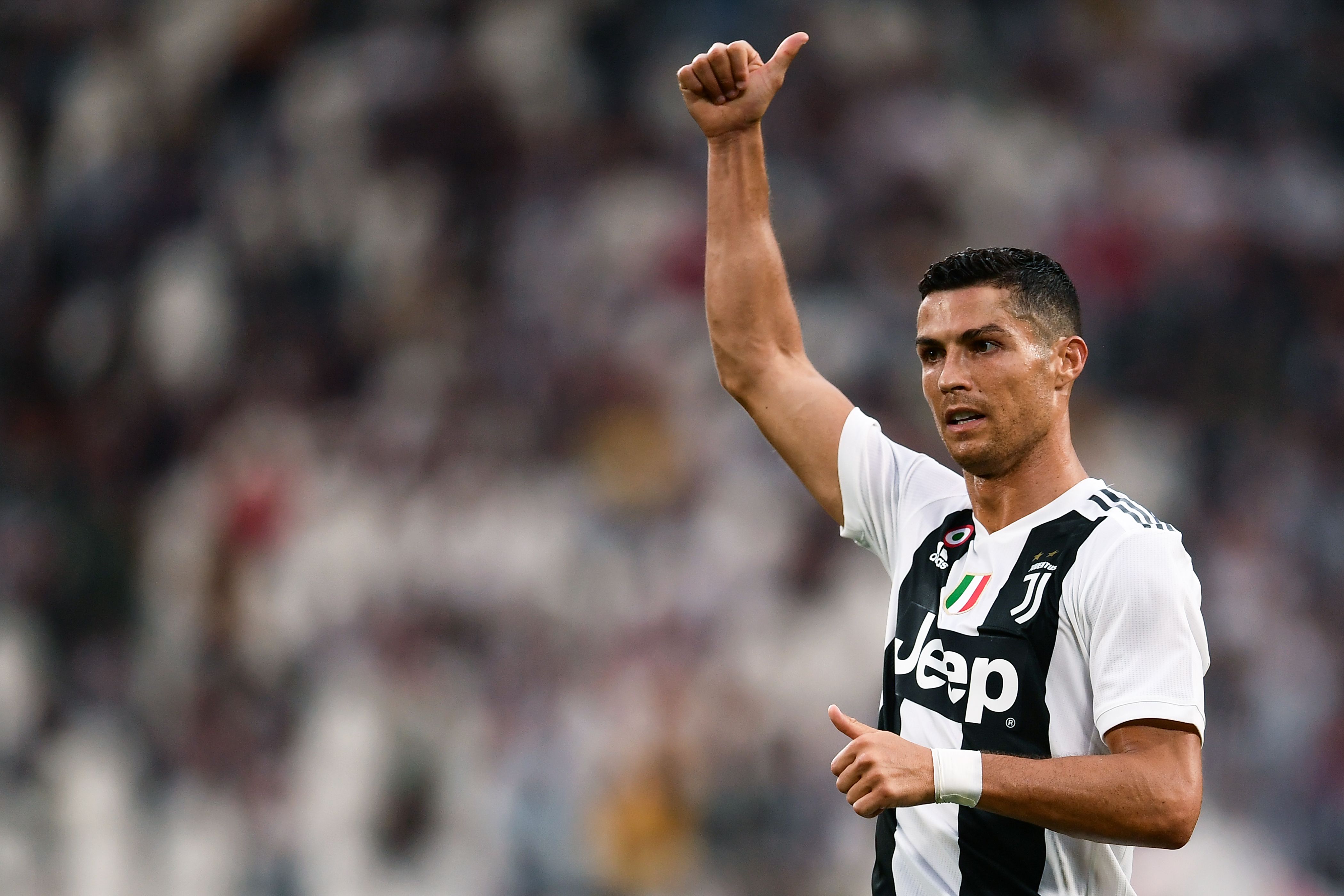 Juventus' Portuguese forward Cristiano Ronaldo gestures during the Italian Serie A football match Juventus vs Lazio on August 25, 2018 at the Allianz Stadium in Turin. (Photo by MARCO BERTORELLO / AFP)        (Photo credit should read MARCO BERTORELLO/AFP/Getty Images)