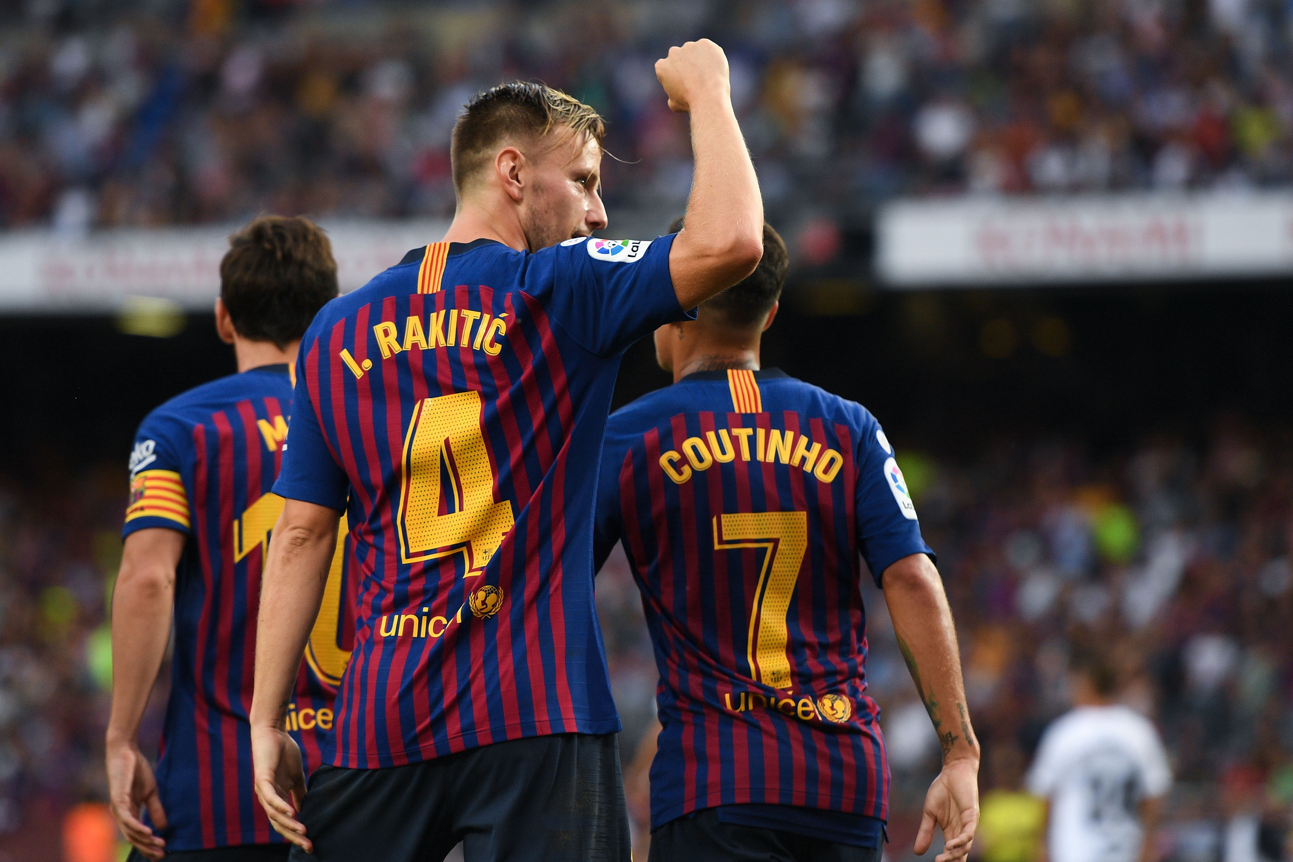 BARCELONA, SPAIN - SEPTEMBER 02:  Ivan Rakitic of FC Barcelona celebrates after scoring his team's fifth goal during the La Liga match between FC Barcelona and SD Huesca at Camp Nou on September 2, 2018 in Barcelona, Spain.  (Photo by David Ramos/Getty Images)