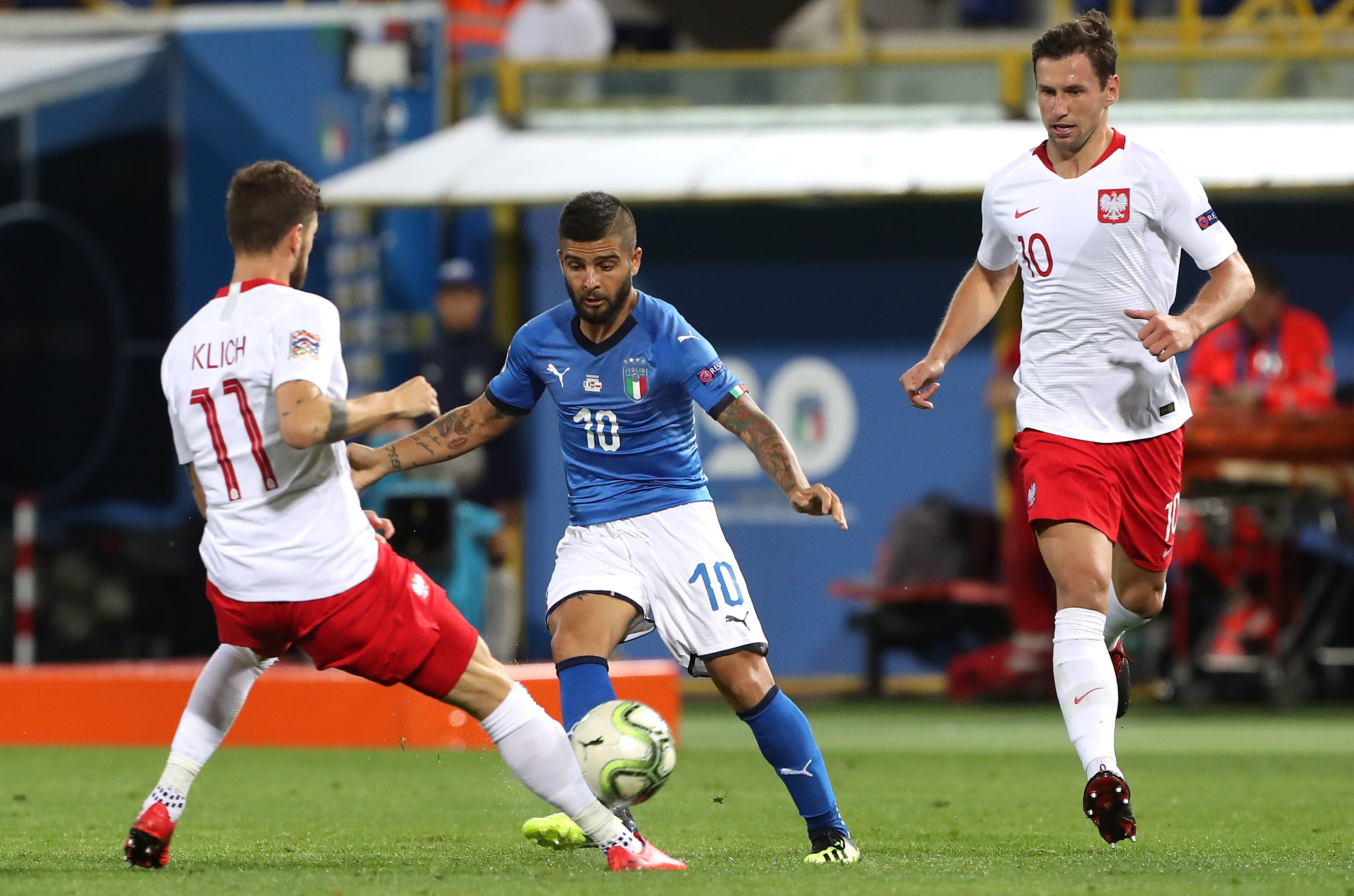 BOLOGNA, ITALY - SEPTEMBER 07:  Lorenzo Insigne of Italy competes for the ball against Mateusz Klich of Poland during the UEFA Nations League A group three match between Italy and Poland at Stadio Renato Dall'Ara on September 7, 2018 in Bologna, Italy.  (Photo by Marco Luzzani/Getty Images)