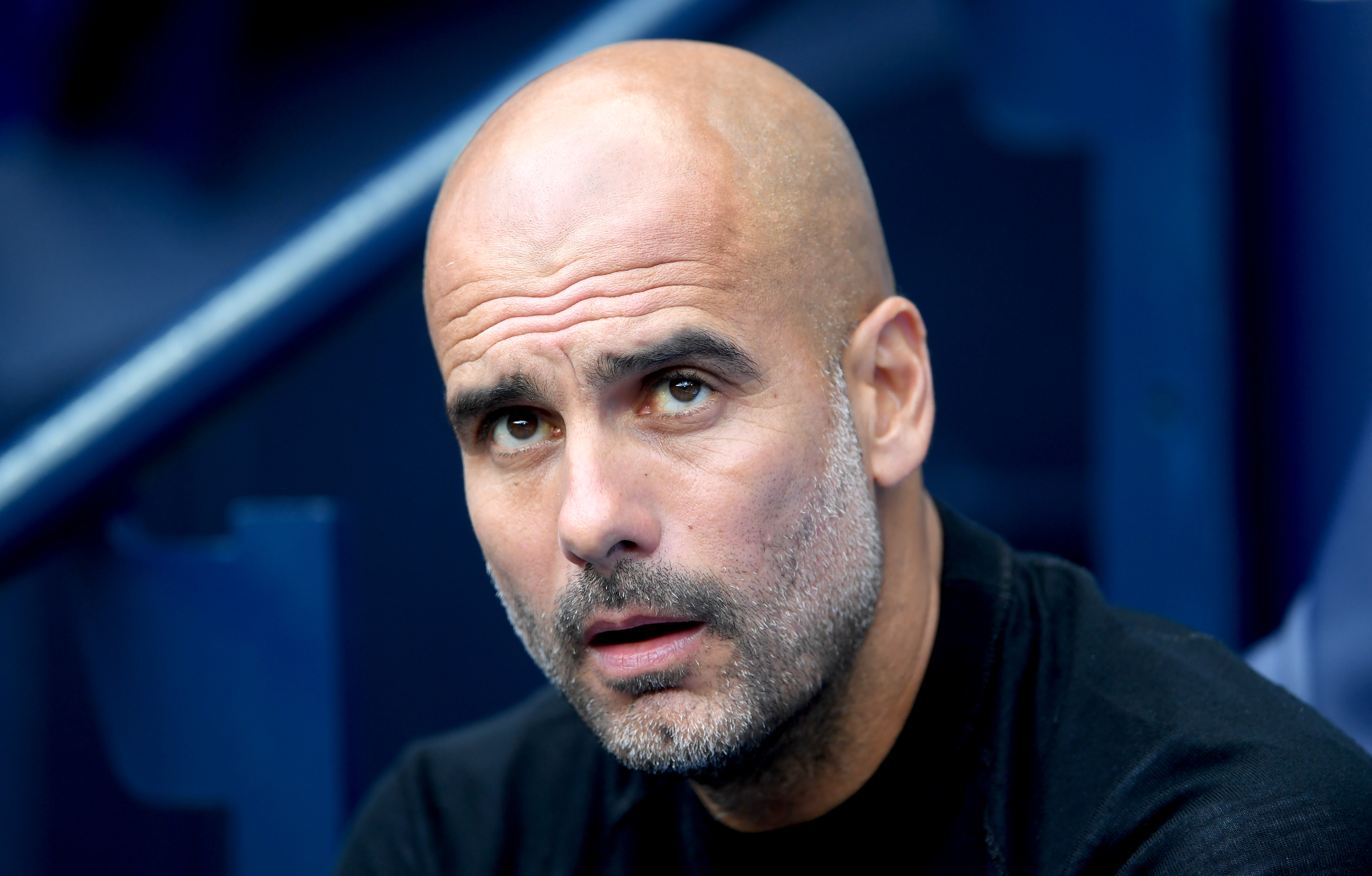 MANCHESTER, ENGLAND - SEPTEMBER 15:  Josep Guardiola, Manager of Manchester City looks on ahead of the Premier League match between Manchester City and Fulham FC at Etihad Stadium on September 15, 2018 in Manchester, United Kingdom.  (Photo by Laurence Griffiths/Getty Images)