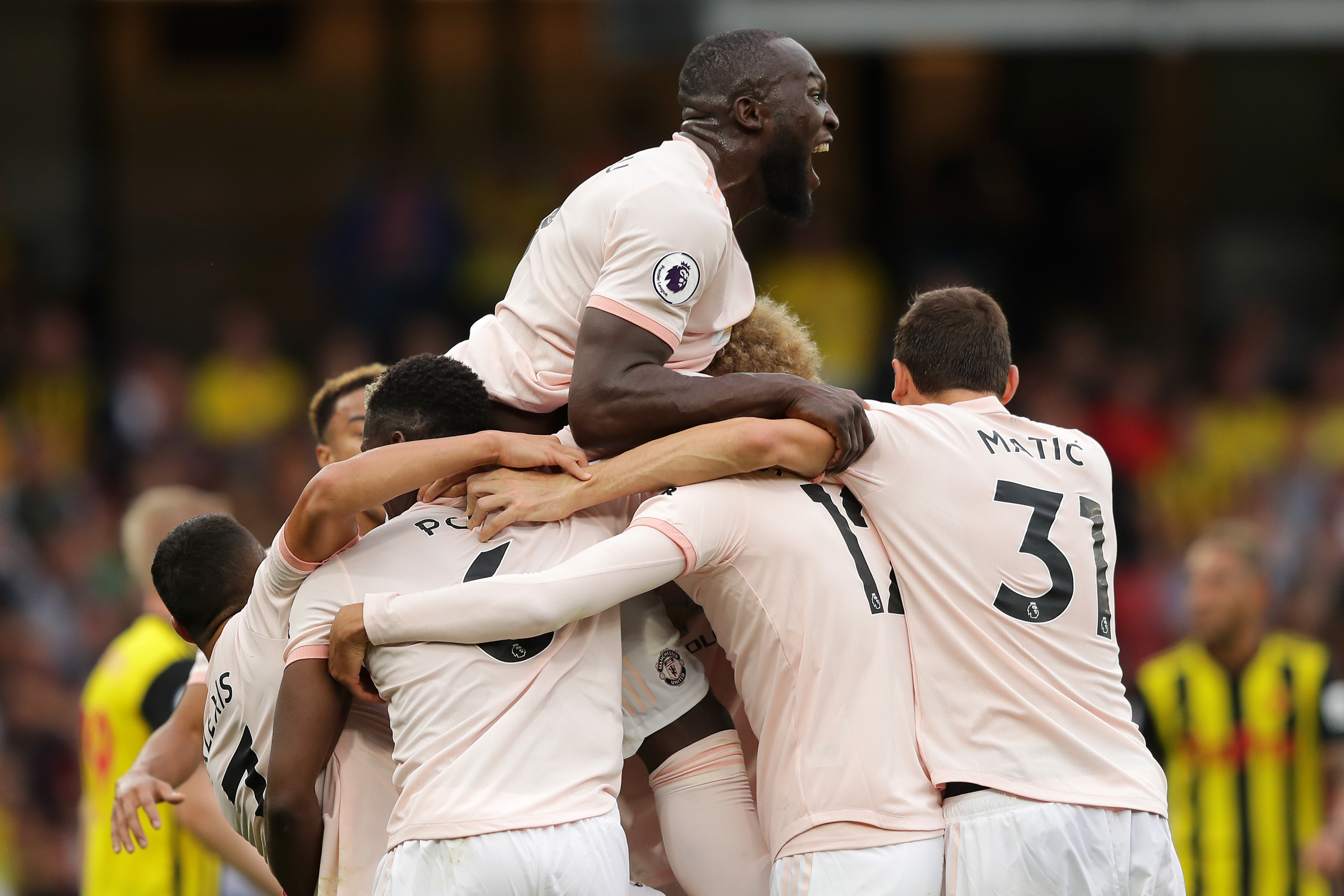 WATFORD, ENGLAND - SEPTEMBER 15:  Chris Smalling of Manchester United celebrates with teammates after scoring his team's second goal during the Premier League match between Watford FC and Manchester United at Vicarage Road on September 15, 2018 in Watford, United Kingdom.  (Photo by Richard Heathcote/Getty Images)