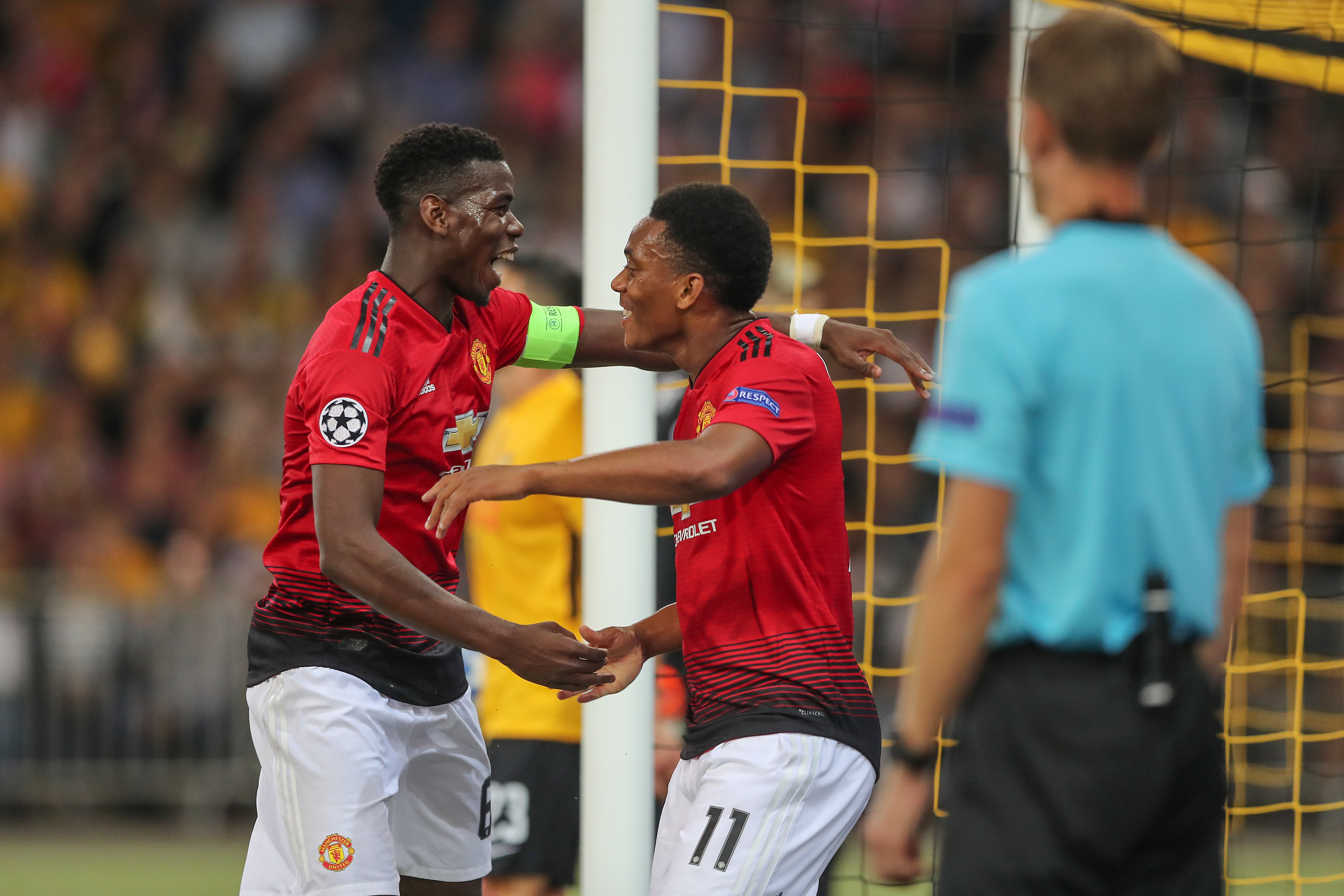 BERN, SWITZERLAND - SEPTEMBER 19:  Anthony Martial of Manchester United and Paul Pogba of Manchester United celebrate the third goal for Manchester during the Group H match of the UEFA Champions League between BSC Young Boys and Manchester United at Stade de Suisse, Wankdorf on September 19, 2018 in Bern, Switzerland. (Photo by Christian Kaspar-Bartke/Getty Images)
