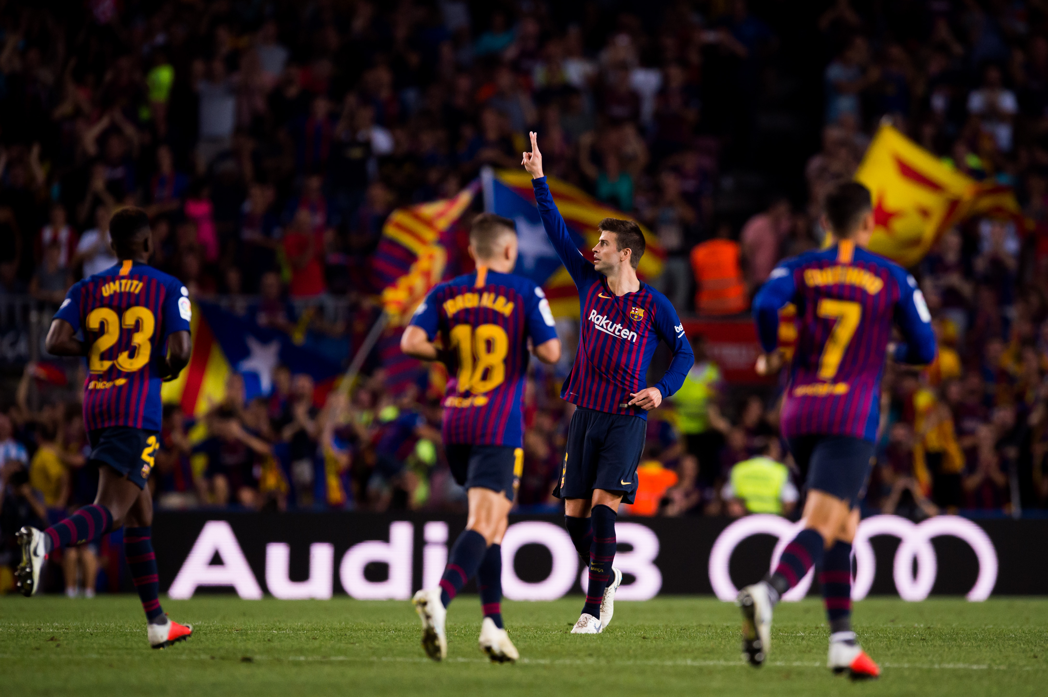 BARCELONA, SPAIN - SEPTEMBER 23:  Gerard Pique of FC Barcelona celebrates after scoring his sides second goal during the La Liga match between FC Barcelona and Girona FC at Camp Nou on September 23, 2018 in Barcelona, Spain.  (Photo by Alex Caparros/Getty Images)