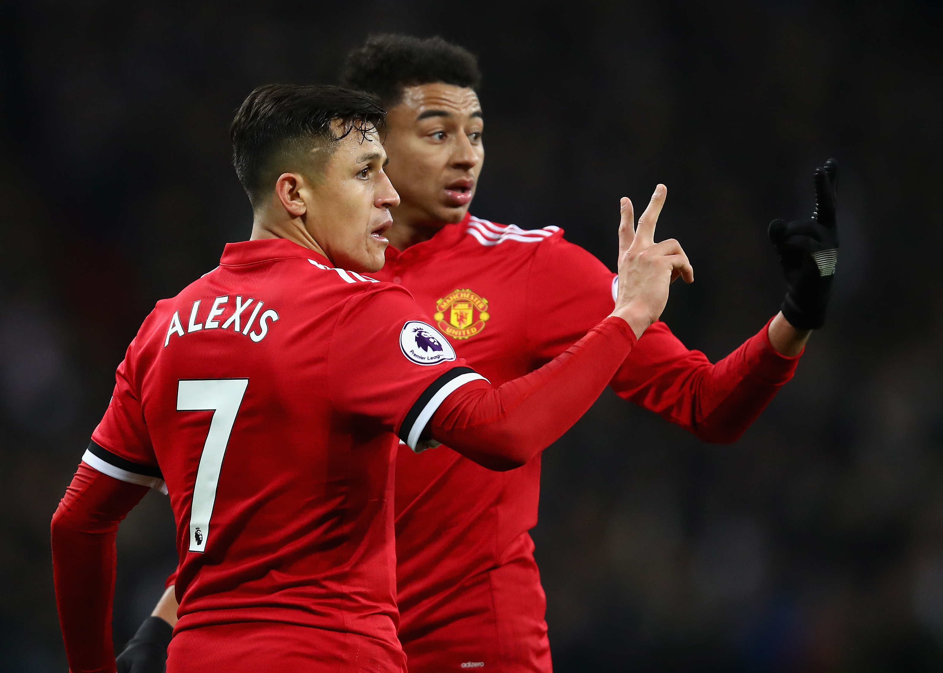 LONDON, ENGLAND - JANUARY 31:  Alexis Sanchez of Manchester United and Jesse Lingard of Manchester United line up a wall during the Premier League match between Tottenham Hotspur and Manchester United at Wembley Stadium on January 31, 2018 in London, England.  (Photo by Julian Finney/Getty Images)
