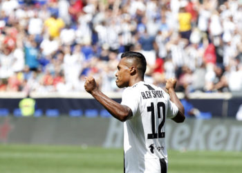 HARRISON, NJ - JULY 28: Alex Sandro #12 of Juventus celebrates his game winning goal in penalty kicks against Benfica during the International Champions Cup 2018 match between Benfica and Juventus at Red Bull Arena on July 28, 2018 in Harrison, New Jersey. (Photo by Adam Hunger/Getty Images)