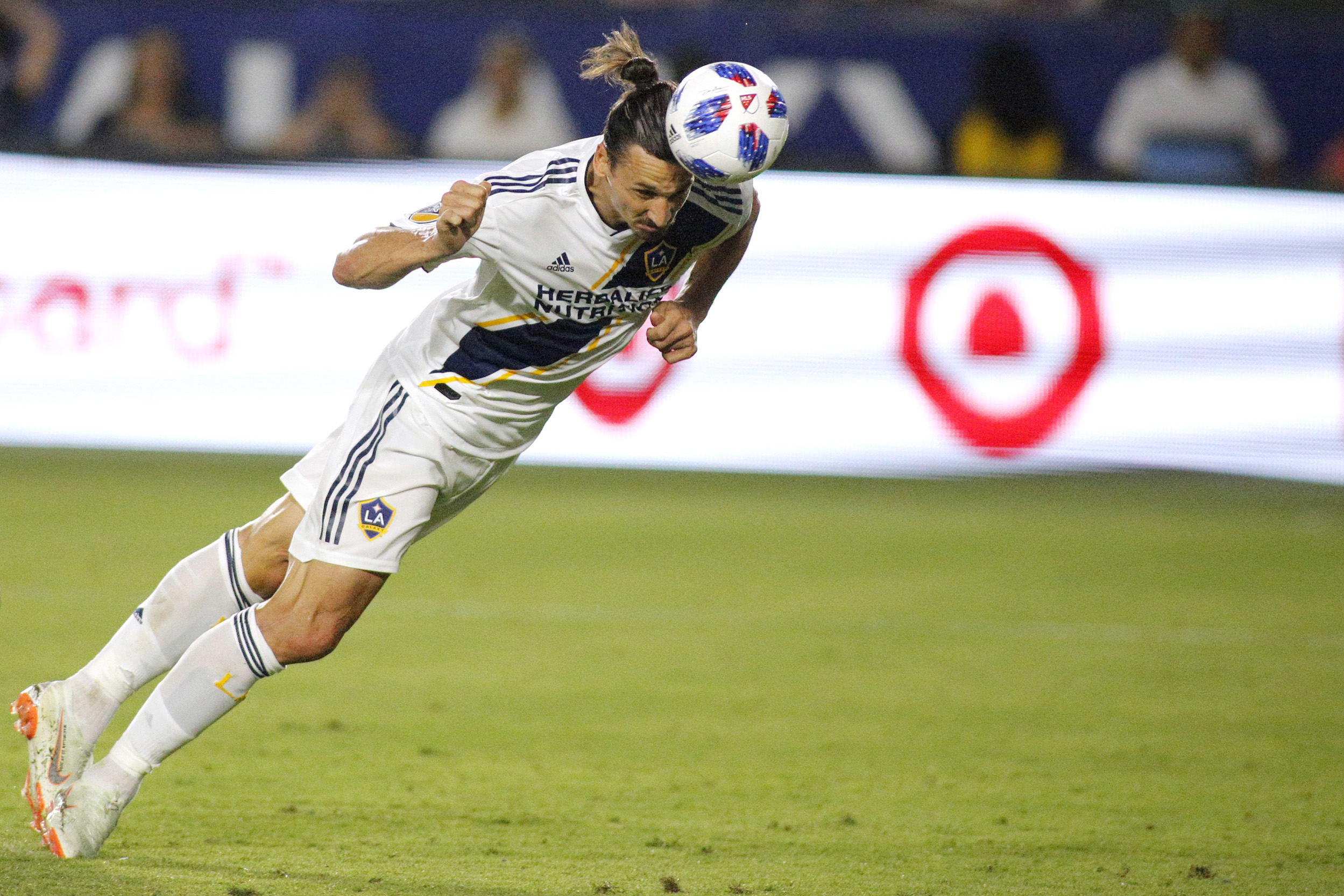 CARSON, CA - JULY 29:  Zlatan Ibrahimovic #9 of the Los Angeles Galaxy heads the ball into the goal at StubHub Center on July 29, 2018 in Carson, California. (Photo by Katharine Lotze/Getty Images)