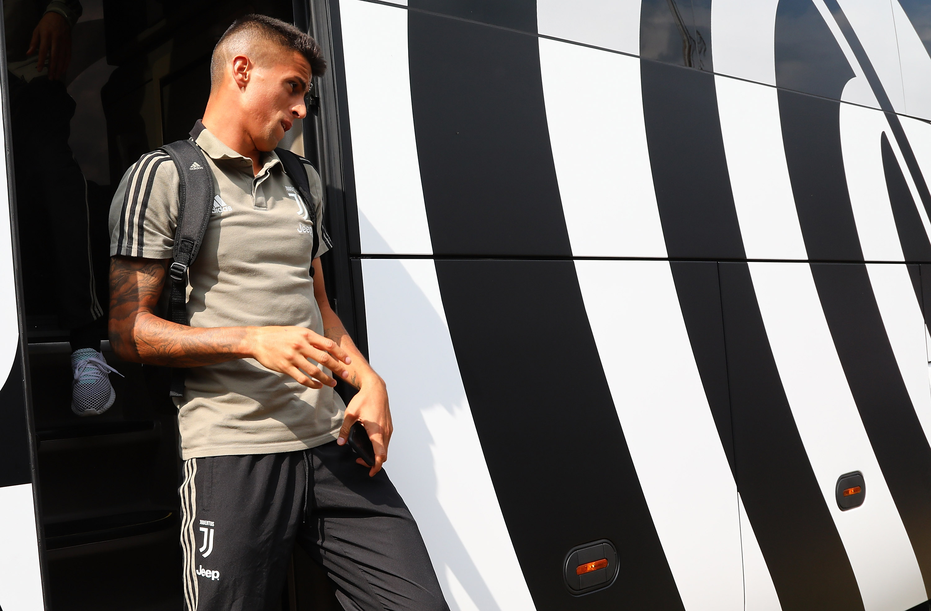 VILLAR PEROSA, ITALY - AUGUST 12:  Joao Cancelo of Juventus arrive at the Pre-Season Friendly match between Juventus and Juventus U19 on August 12, 2018 in Villar Perosa, Italy.  (Photo by Marco Luzzani/Getty Images)