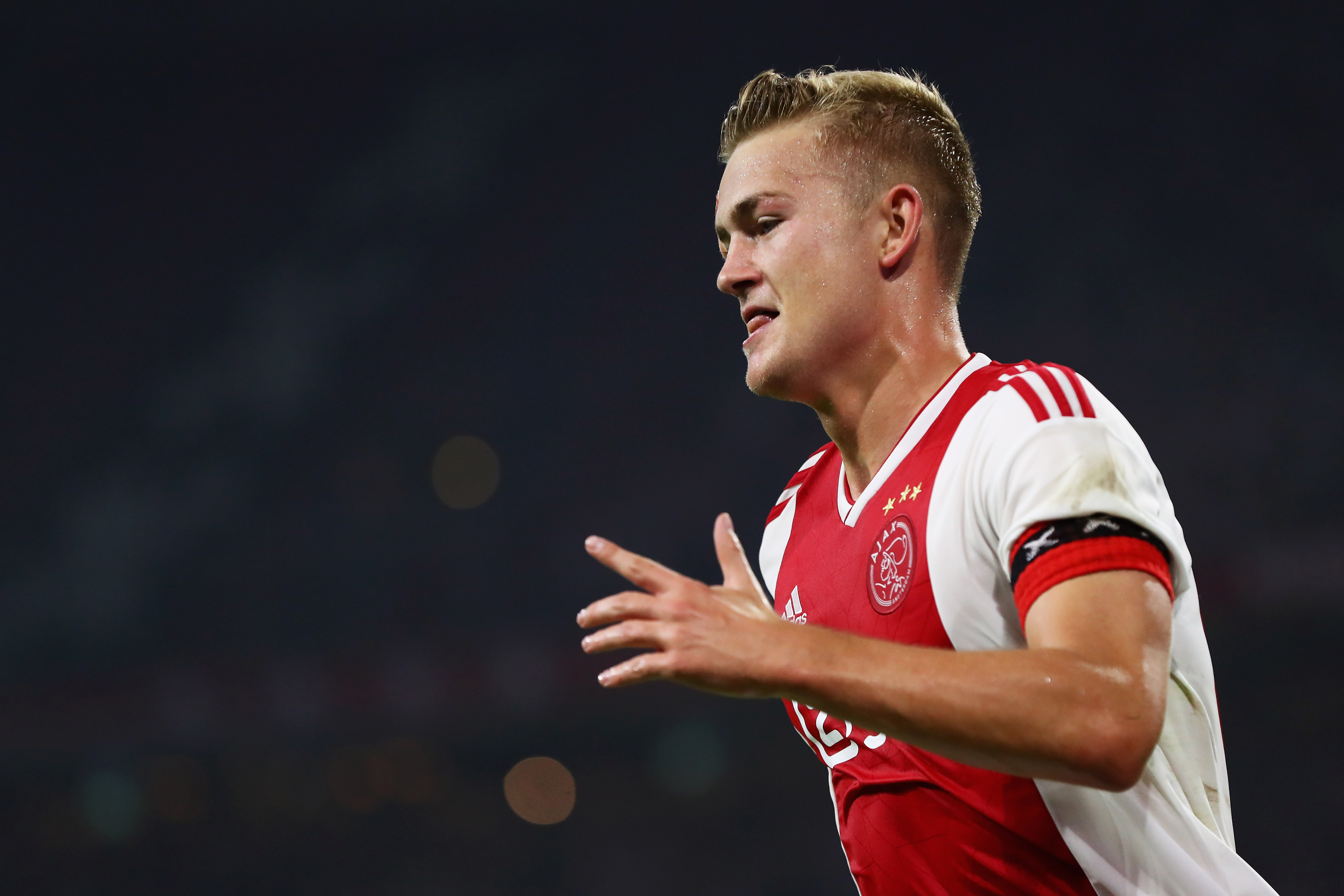 AMSTERDAM, NETHERLANDS - AUGUST 14:  Matthijs de Ligt of Ajax celebrates scoring his teams second goal of the game during the UEFA Champions League third round qualifying match between Ajax and Royal Standard de Liege at Johan Cruyff Arena on August 14, 2018 in Amsterdam, Netherlands.  (Photo by Dean Mouhtaropoulos/Getty Images)