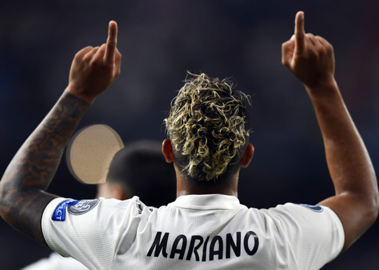 Real Madrid's Spanish-Dominican forward Mariano celebrates his goal during the UEFA Champions League group G football match between Real Madrid CF and AS Roma at the Santiago Bernabeu stadium in Madrid on September 19, 2018. (Photo by GABRIEL BOUYS / AFP)        (Photo credit should read GABRIEL BOUYS/AFP/Getty Images)