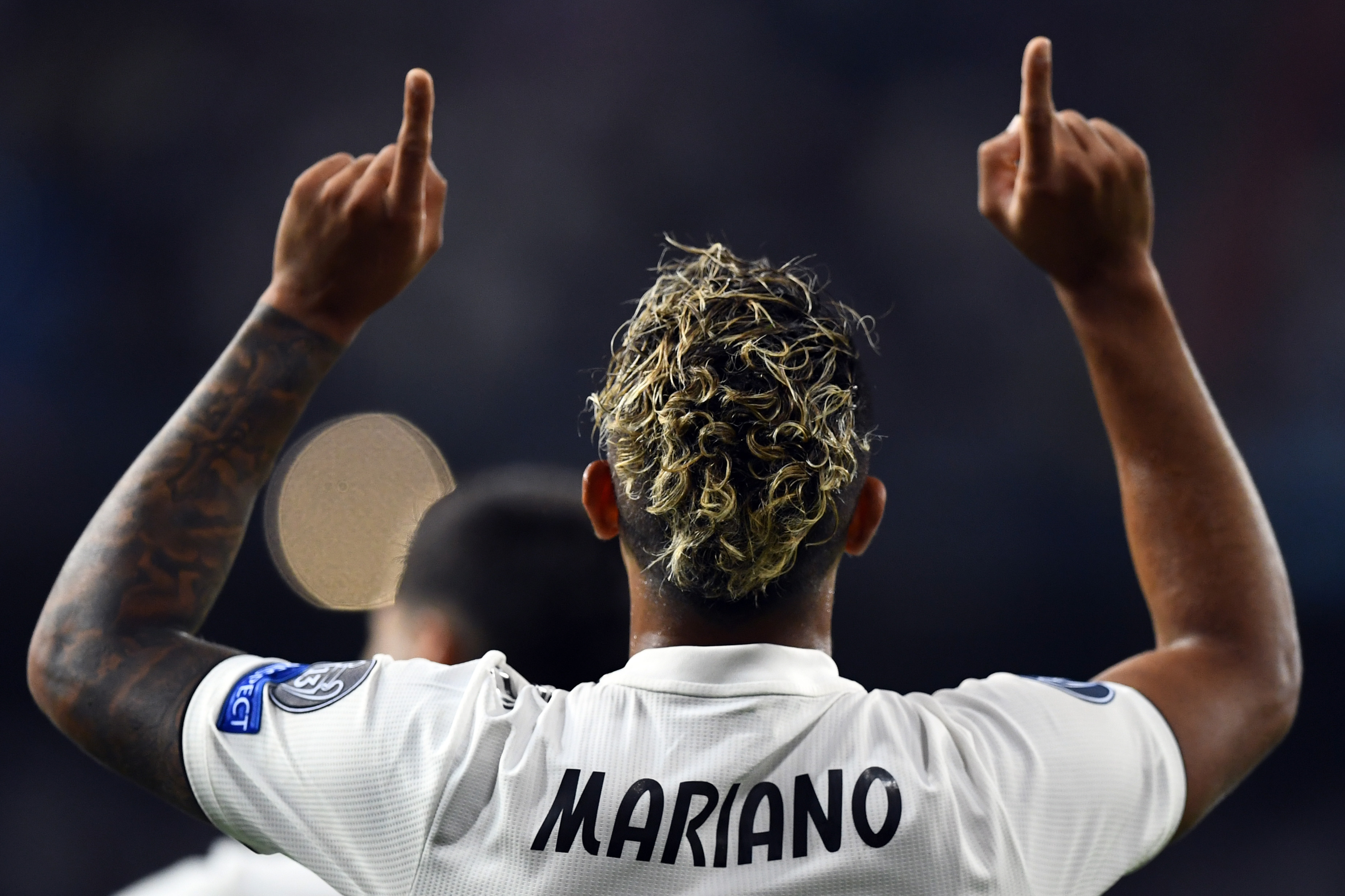 Real Madrid's Spanish-Dominican forward Mariano celebrates his goal during the UEFA Champions League group G football match between Real Madrid CF and AS Roma at the Santiago Bernabeu stadium in Madrid on September 19, 2018. (Photo by GABRIEL BOUYS / AFP)        (Photo credit should read GABRIEL BOUYS/AFP/Getty Images)