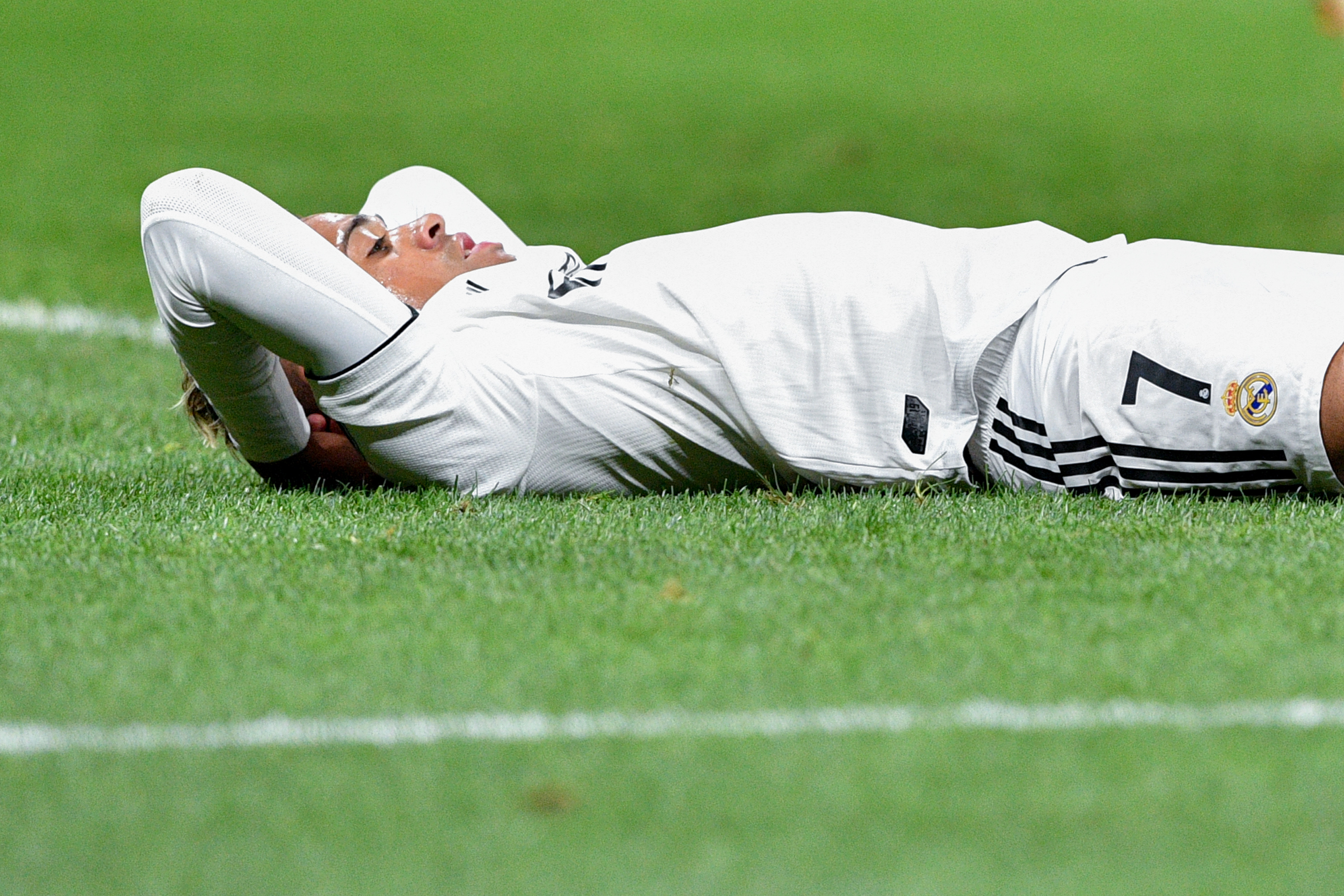 Real Madrid's Spanish-Dominican forward Mariano lies on the pitch during the UEFA Champions League group G football match between PFC CSKA Moscow and Real Madrid CF at the Luzhniki stadium in Moscow on October 2, 2018. (Photo by Mladen ANTONOV / AFP)        (Photo credit should read MLADEN ANTONOV/AFP/Getty Images)