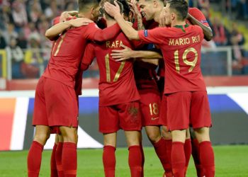 Portugal's forward Rafa Silva (C) celebrates scoring with his team-mates during the UEFA Nations League football match Poland v Portugal at the Slaski Stadium in Chorzow, Poland on October 11, 2018. (Photo by Janek SKARZYNSKI / AFP)        (Photo credit should read JANEK SKARZYNSKI/AFP/Getty Images)