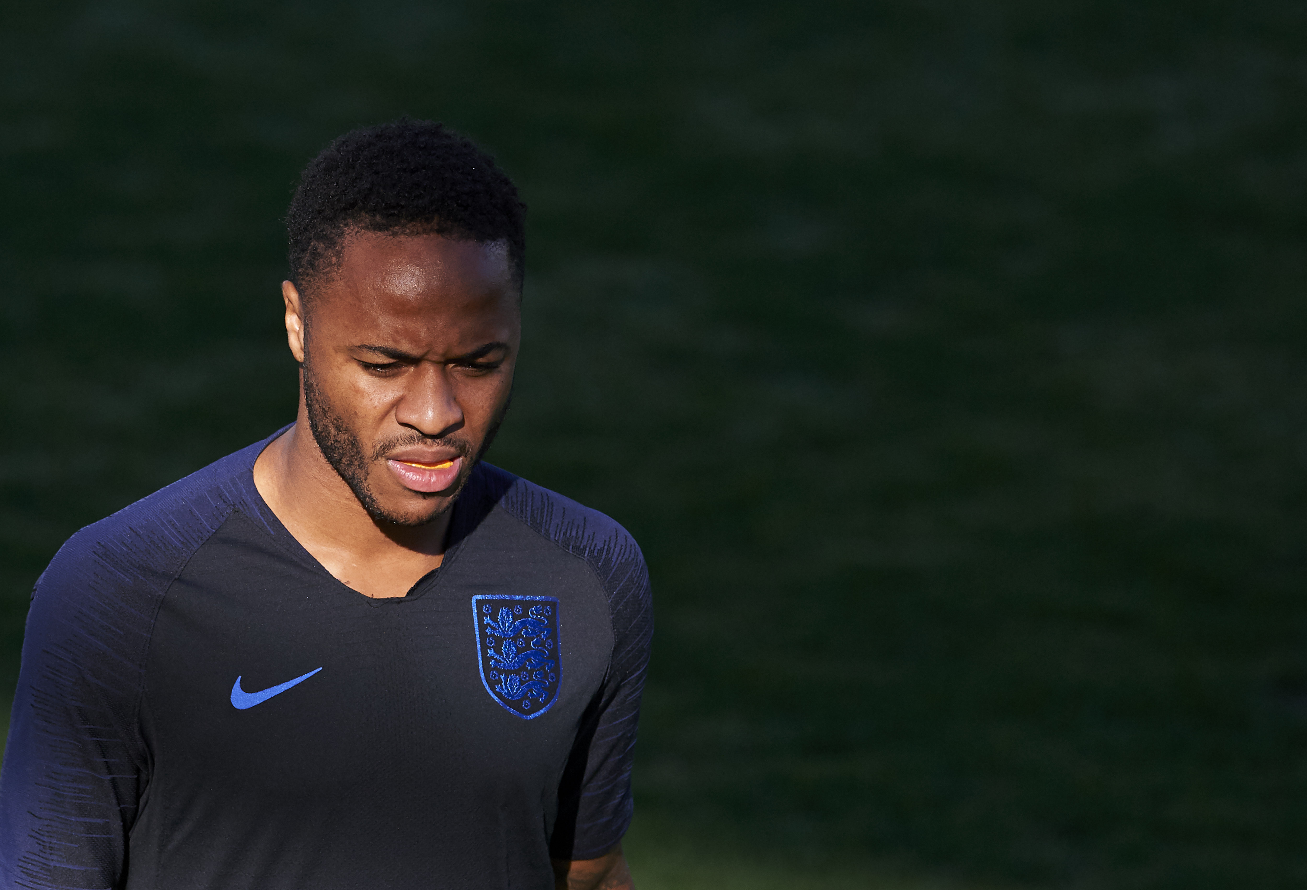 SEVILLE, SPAIN - OCTOBER 14: Raheem Sterling of England looks on during an England training session ahead of their UEFA Nations League match against Spain at Estadio Benito Villamarin on October 14, 2018 in Seville, Spain.  (Photo by Aitor Alcalde/Getty Images)
