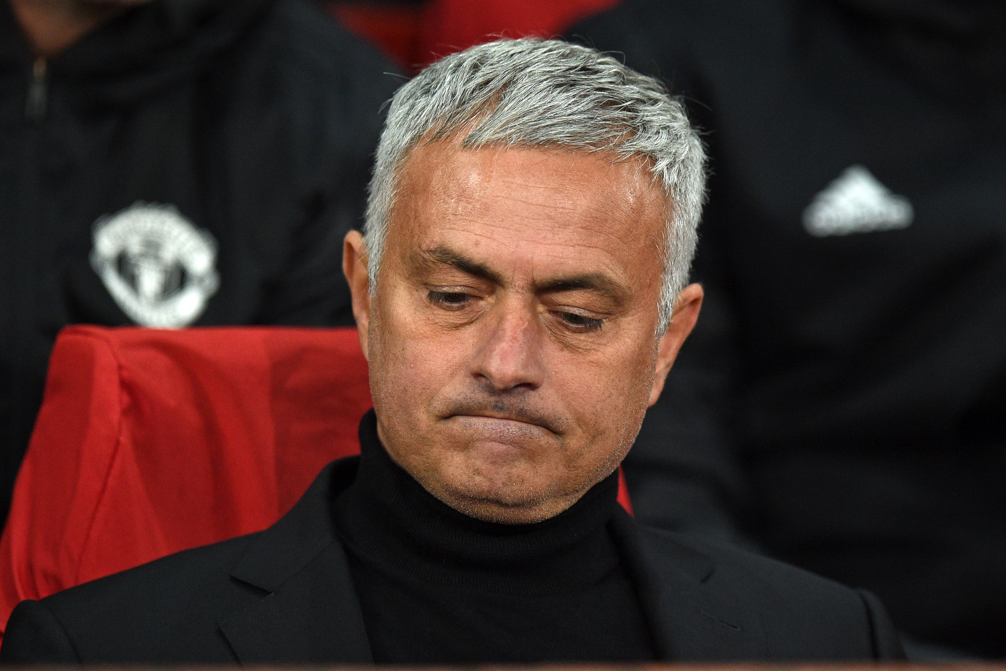 Manchester United's Portuguese manager Jose Mourinho awaits kick off in the Champions League group H football match between Manchester United and Juventus at Old Trafford in Manchester, north west England, on October 23, 2018. (Photo by Oli SCARFF / AFP)        (Photo credit should read OLI SCARFF/AFP/Getty Images)