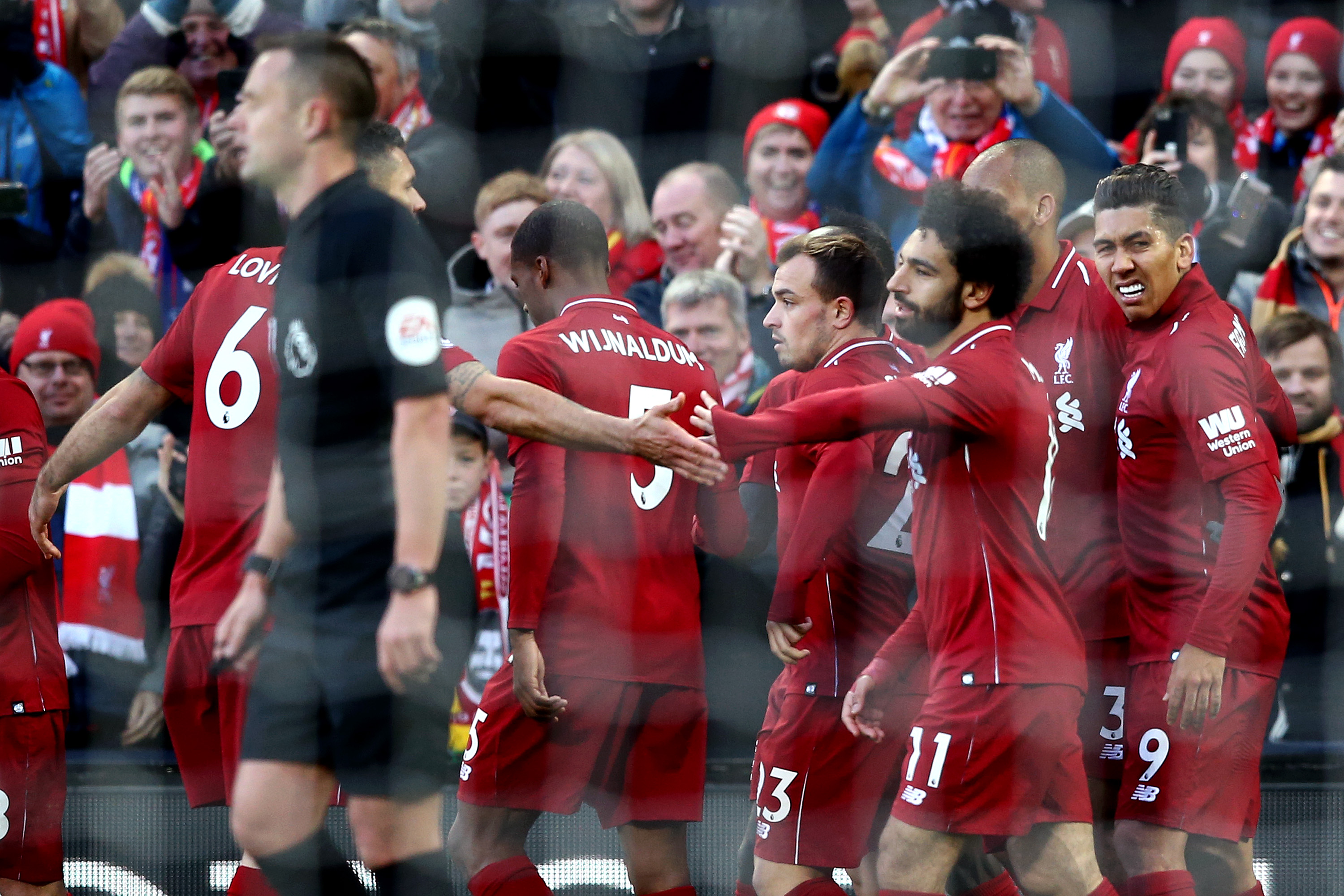 LIVERPOOL, ENGLAND - OCTOBER 27:  Sadio Mane of Liverpool celebrates with teammates after scoring his team's second goal during the Premier League match between Liverpool FC and Cardiff City at Anfield on October 27, 2018 in Liverpool, United Kingdom.  (Photo by Jan Kruger/Getty Images)