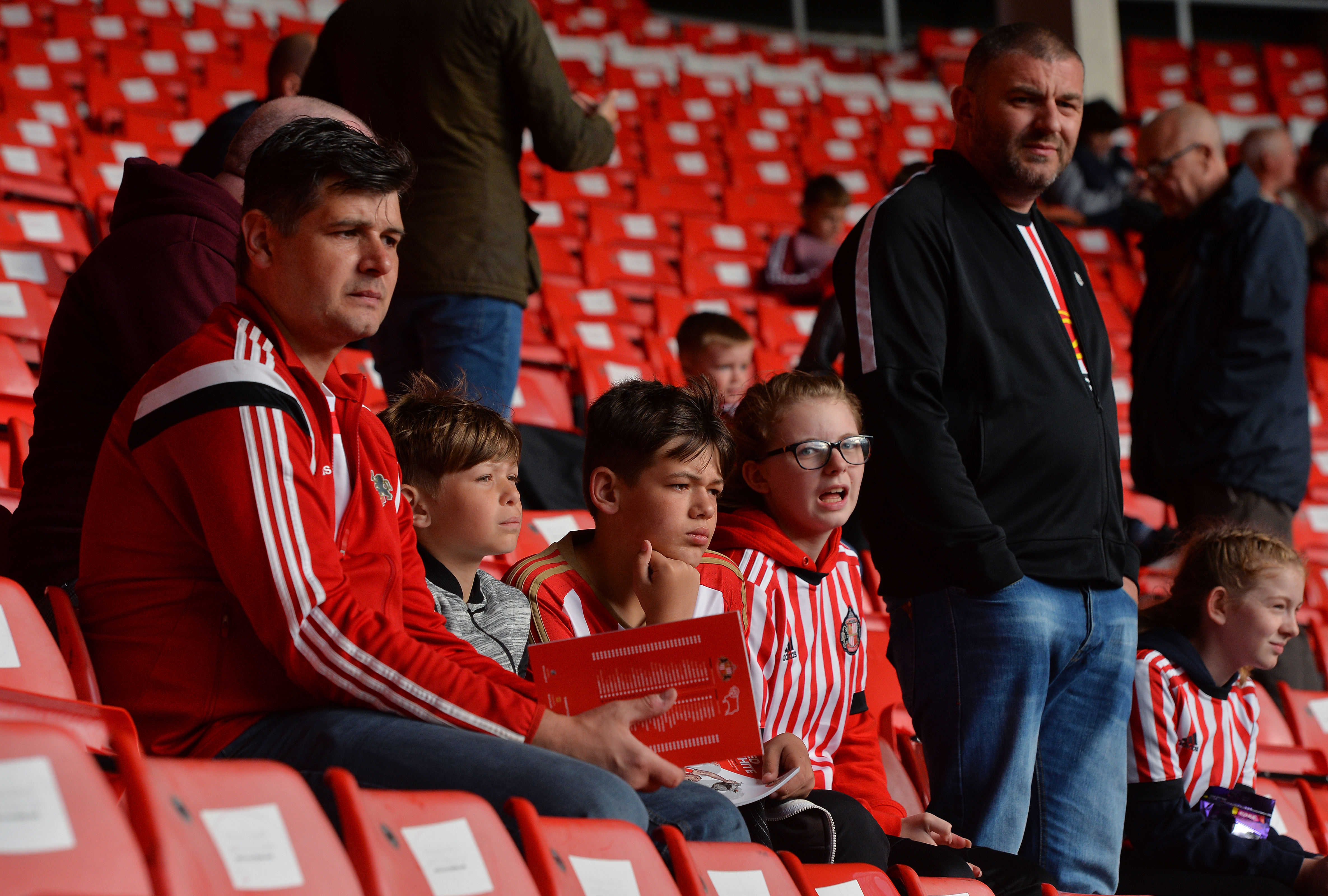 SUNDERLAND, ENGLAND - AUGUST 04:  Sunderland fans look on as players warm up ahead of the Sky Bet Championship match between Sunderland and Derby County at Stadium of Light on August 4, 2017 in Sunderland, England. (Photo by Mark Runnacles/Getty Images)
