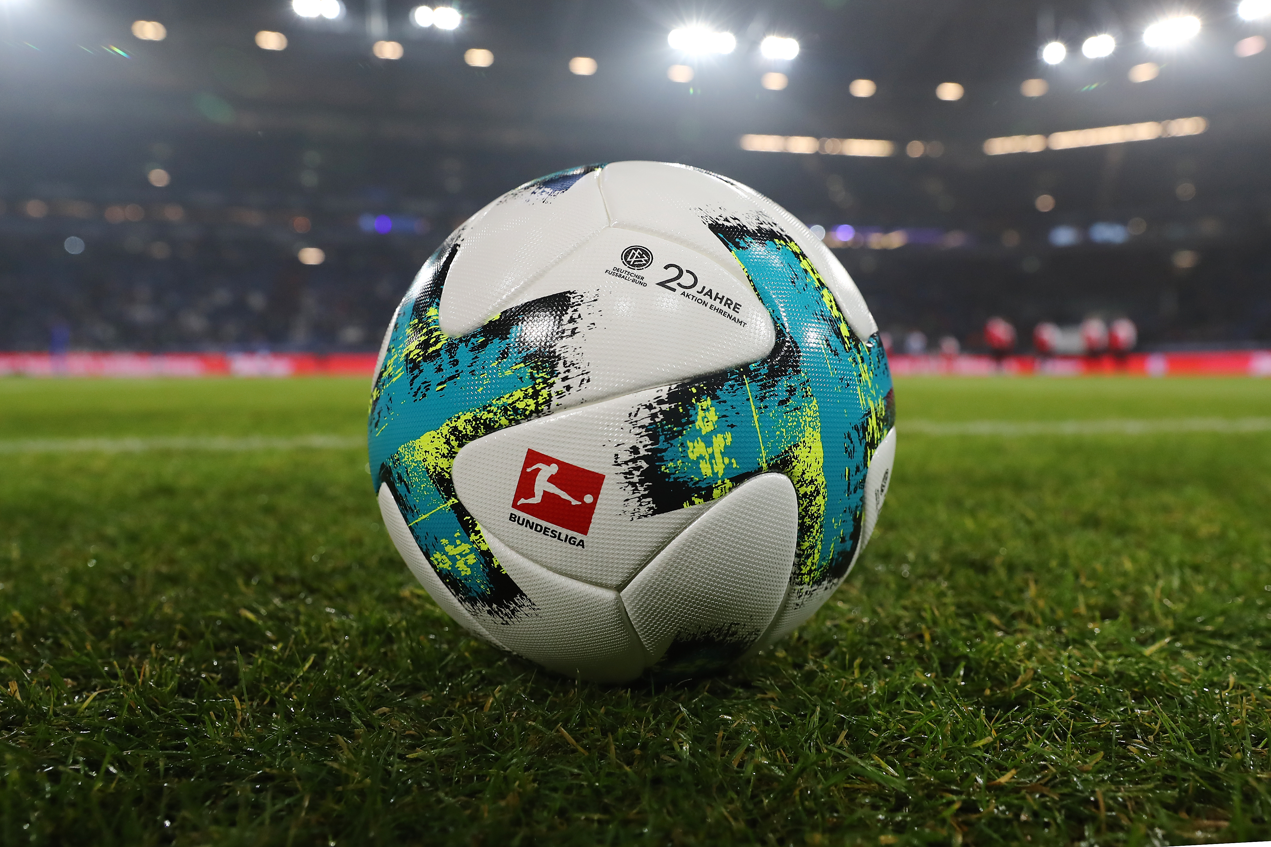 GELSENKIRCHEN, GERMANY - DECEMBER 02: the match ball with a logo in celebration of 20 years of volunteers during the Bundesliga match between FC Schalke 04 and 1. FC Koeln at Veltins-Arena on December 2, 2017 in Gelsenkirchen, Germany. (Photo by Christof Koepsel/Bongarts/Getty Images)