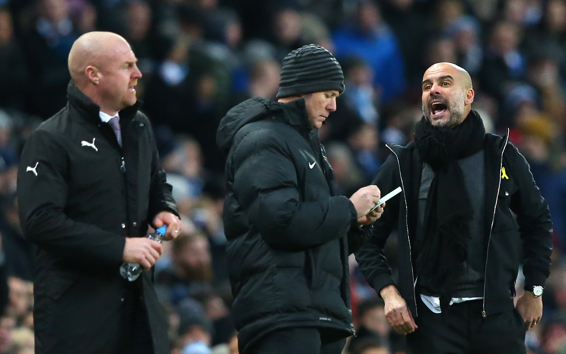 MANCHESTER, ENGLAND - JANUARY 06:  Sean Dyche, Manager of Burnley and Josep Guardiola, Manager of Manchester City argue during the The Emirates FA Cup Third Round match between Manchester City and Burnley at Etihad Stadium on January 6, 2018 in Manchester, England.  (Photo by Alex Livesey/Getty Images)