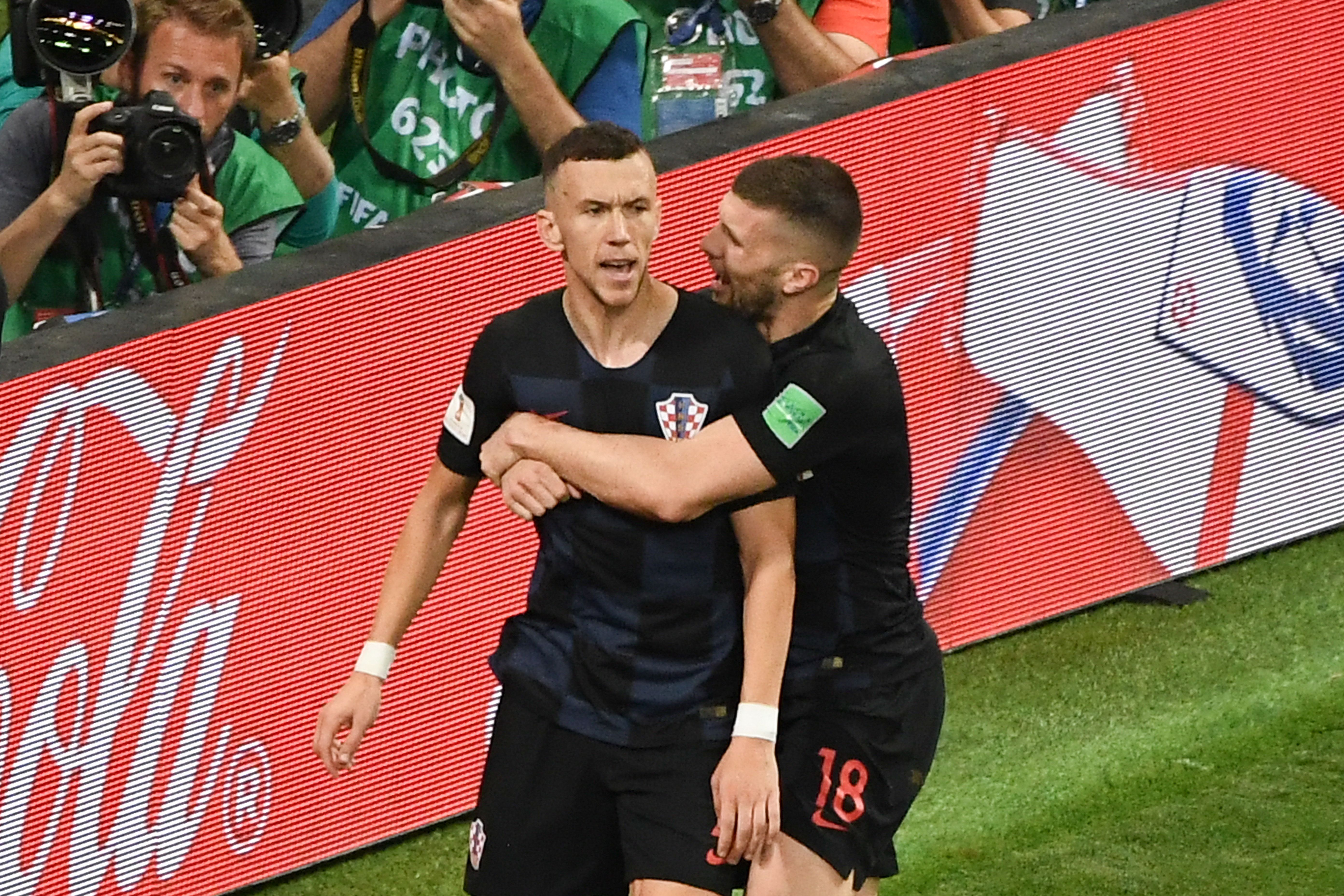 Croatia's forward Ivan Perisic (L) celebrates with Croatia's forward Ante Rebic after scoring his team's first goal  during the Russia 2018 World Cup semi-final football match between Croatia and England at the Luzhniki Stadium in Moscow on July 11, 2018. (Photo by Jewel SAMAD / AFP) / RESTRICTED TO EDITORIAL USE - NO MOBILE PUSH ALERTS/DOWNLOADS        (Photo credit should read JEWEL SAMAD/AFP/Getty Images)