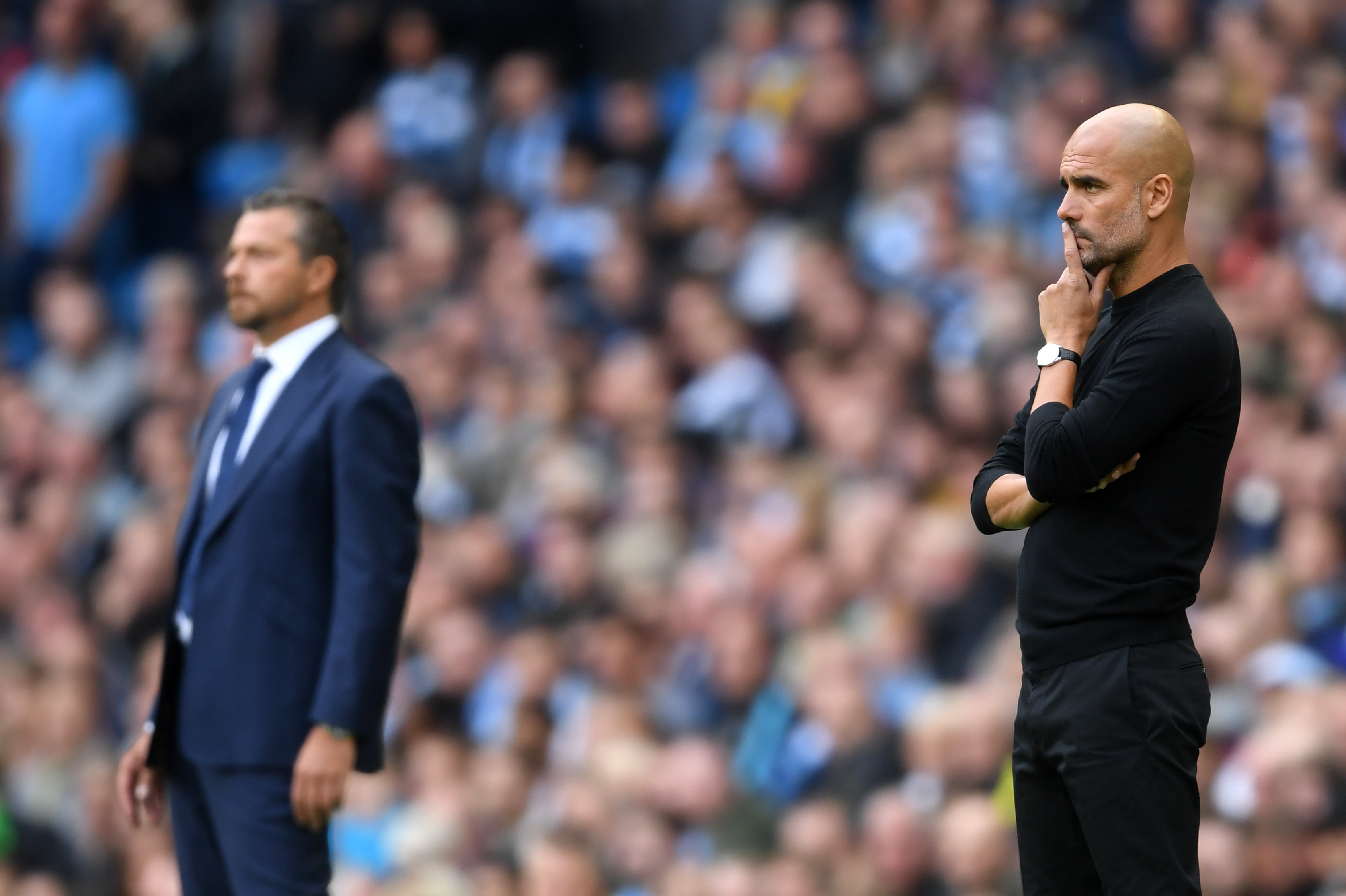 MANCHESTER, ENGLAND - SEPTEMBER 15: Josep Guardiola, Manager of Manchester City looks on during the Premier League match between Manchester City and Fulham FC at Etihad Stadium on September 15, 2018 in Manchester, United Kingdom.  (Photo by Laurence Griffiths/Getty Images)
