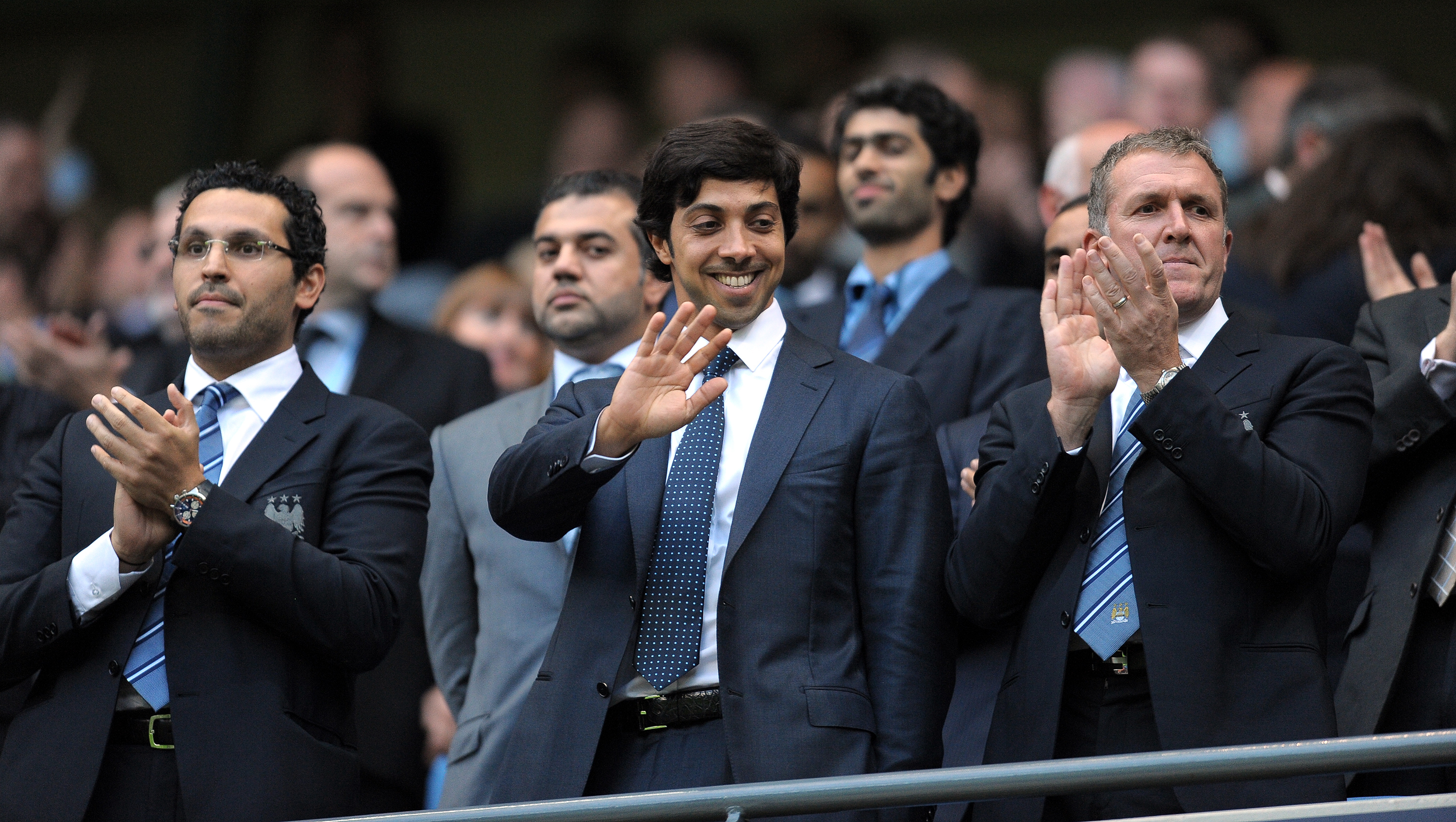 Manchester city owner Sheikh Mansour bin Zayed Al Nahyan (C) looks on during the English Premier League football match against Liverpool at The City of Manchester stadium, Manchester, north-west England on August 23, 2010. AFP PHOTO/ANDREW YATES.  FOR  EDITORIAL USE Additional licence required for any commercial/promotional use or use on TV or internet (except identical online version of newspaper) of Premier League/Football League photos. Tel DataCo +44 207 2981656. Do not alter/modify photo (Photo credit should read ANDREW YATES/AFP/Getty Images)