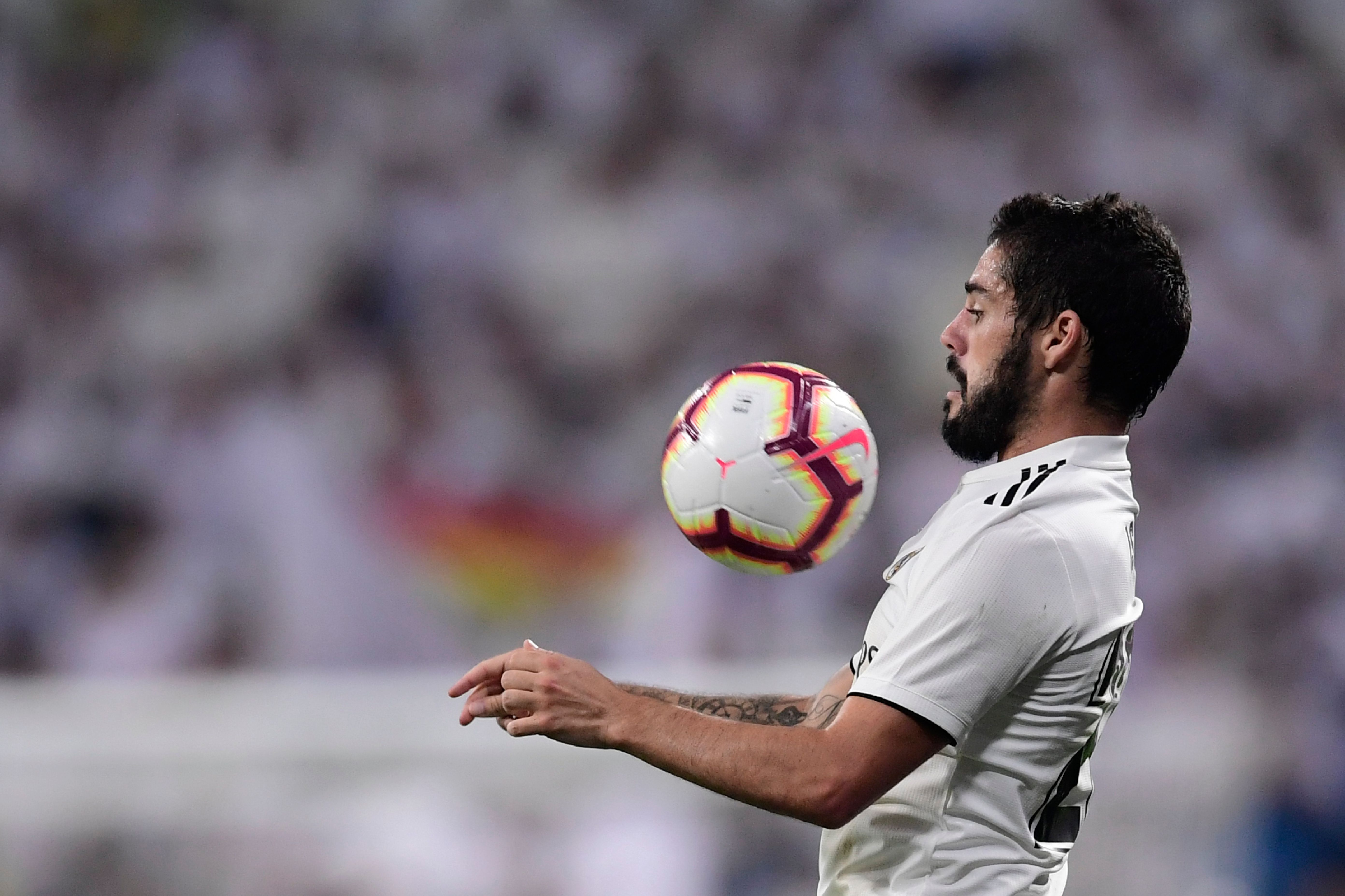 Real Madrid's Spanish midfielder Isco controls the ball during the Spanish league football match between Real Madrid CF and RCD Espanyol at the Santiago Bernabeu stadium in Madrid on September 22, 2018. (Photo by JAVIER SORIANO / AFP)        (Photo credit should read JAVIER SORIANO/AFP/Getty Images)
