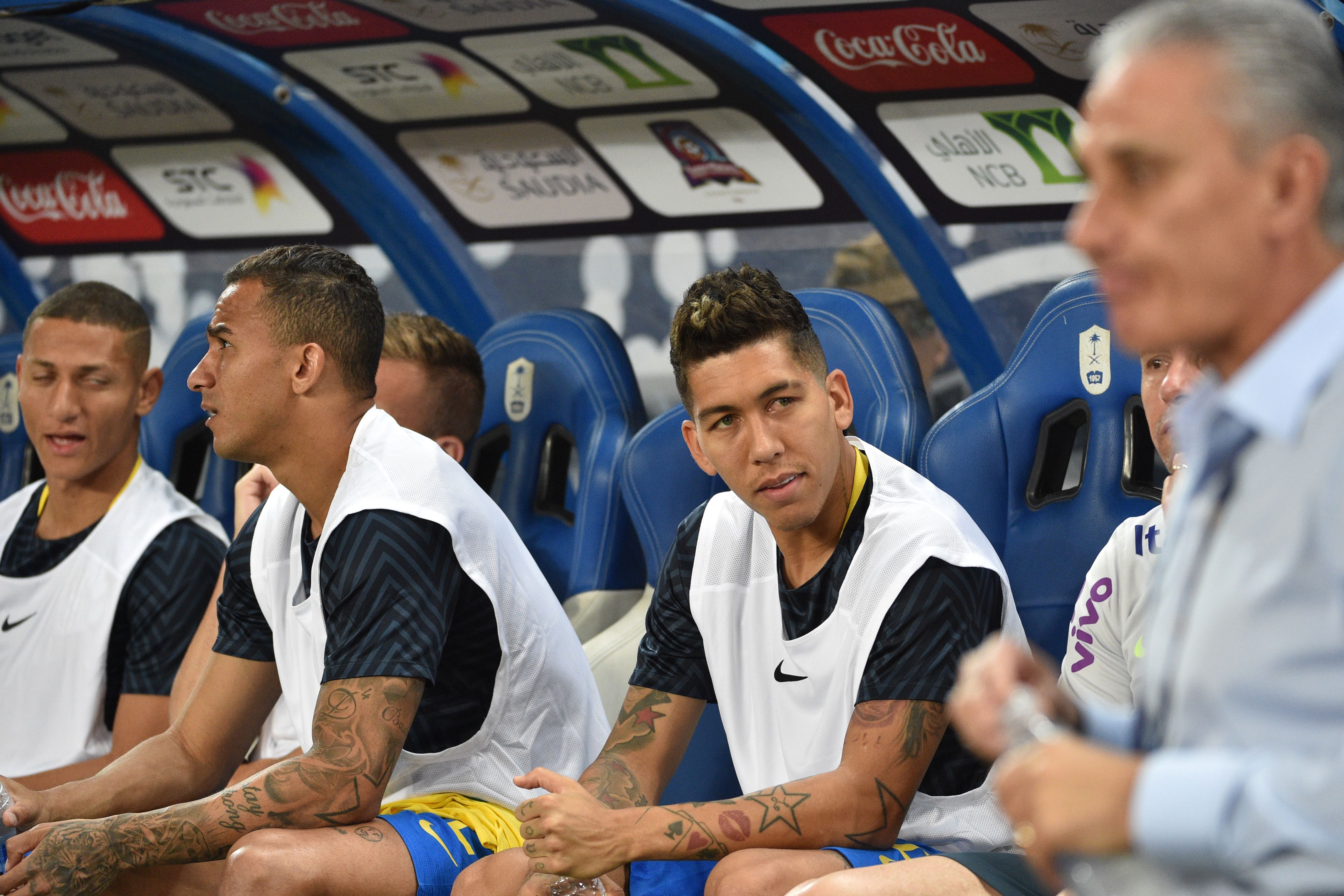 Brazil's forward Roberto Firmino (2nd-R) looks at his coach Adenor Leonardo Bacchi (Tite) during the friendly football match between Saudi Arabia and Brazil at the King Saud University Stadium in Riyadh on October 12, 2018. (Photo by FAYEZ NURELDINE / AFP)        (Photo credit should read FAYEZ NURELDINE/AFP/Getty Images)