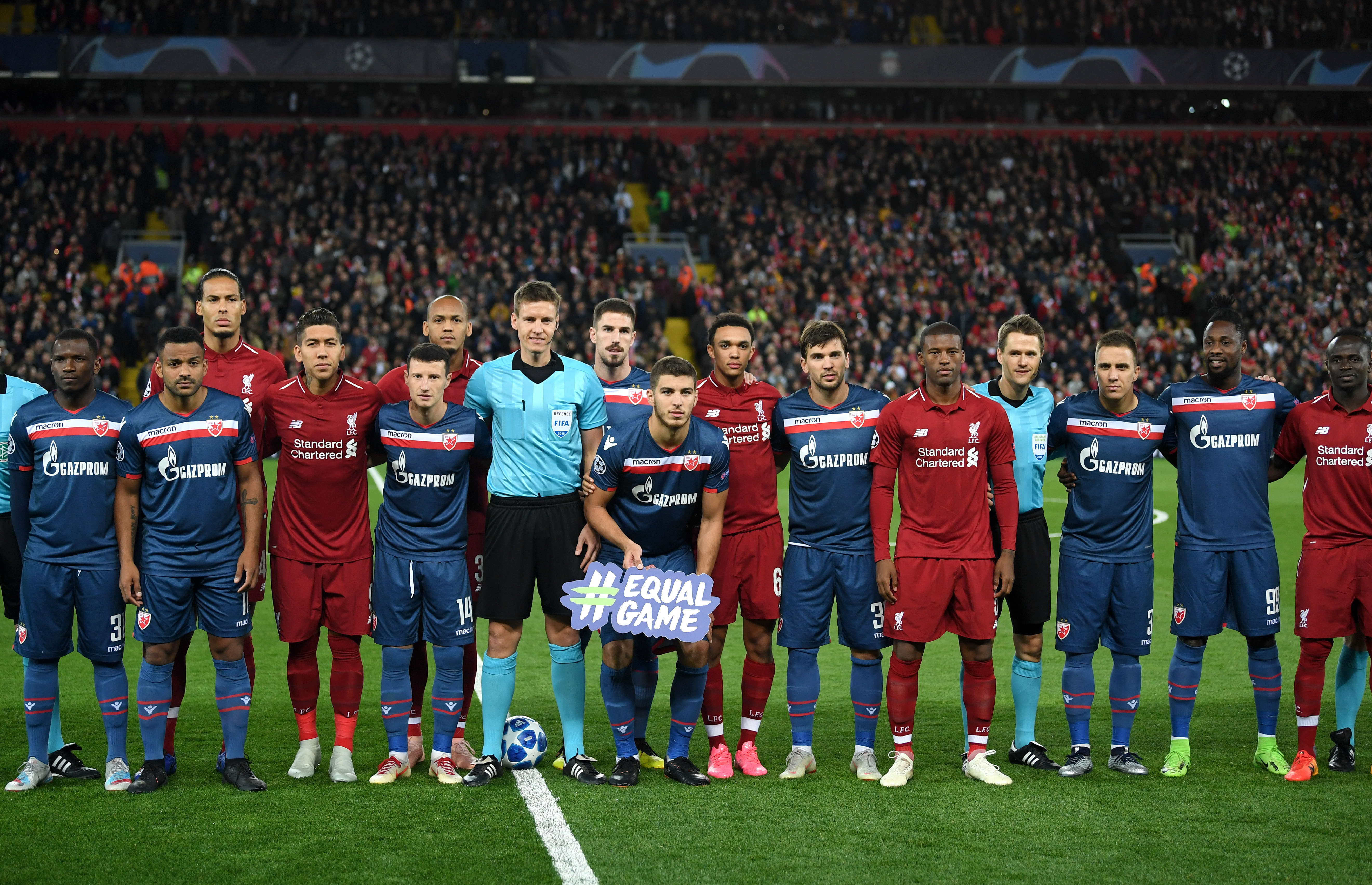 LIVERPOOL, ENGLAND - OCTOBER 24:  Liverpool and FK Crvena Zvezda players line up prior to the Group C match of the UEFA Champions League between Liverpool and FK Crvena Zvezda at Anfield on October 24, 2018 in Liverpool, United Kingdom.  (Photo by Michael Regan/Getty Images)