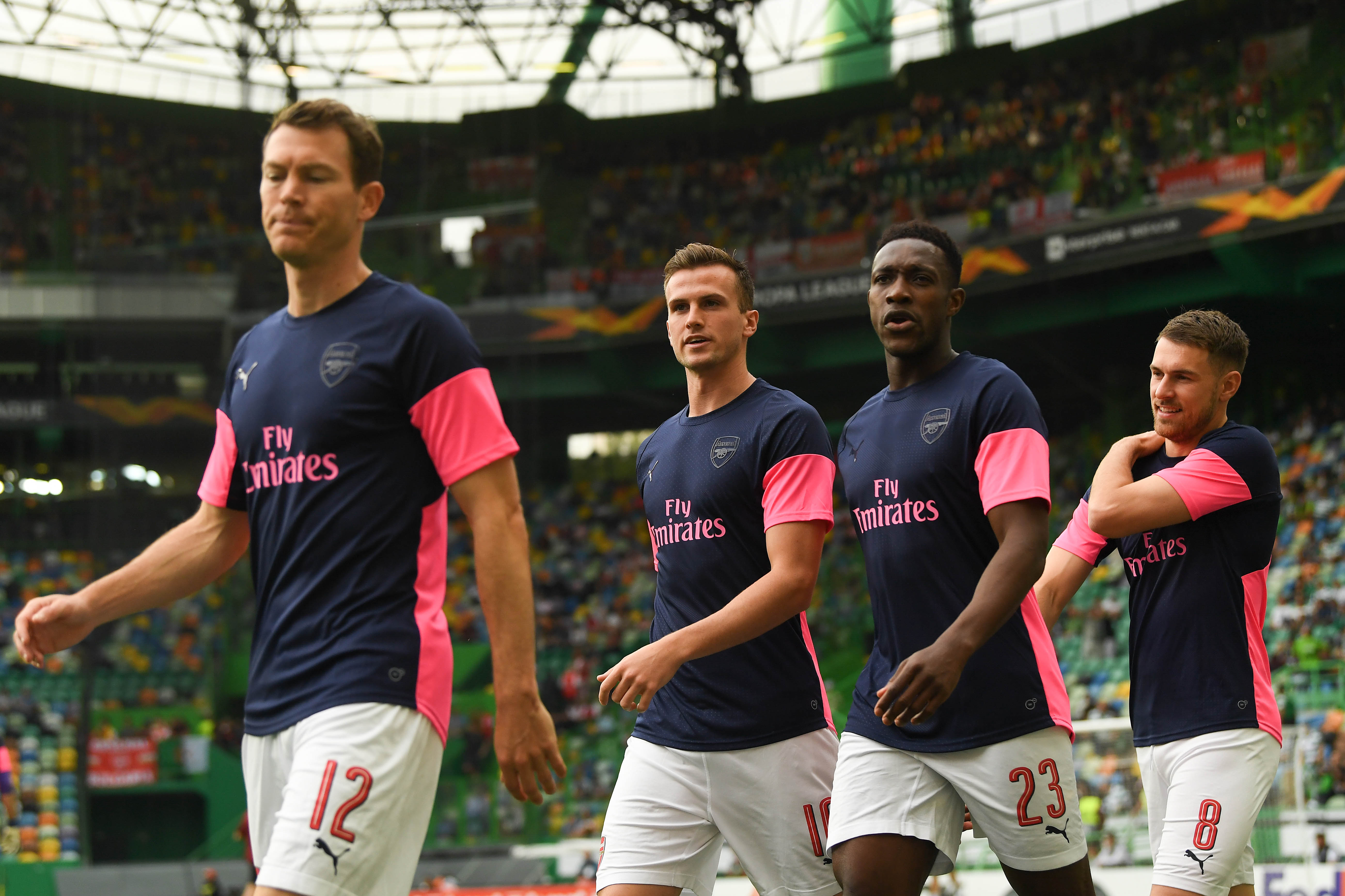 LISBON, PORTUGAL - OCTOBER 25: (L-R)  Stephan Lichteiner, Rob Holding, Danny Welbeck and Aaron Ramsey of Arsenal FC look on during the warm up prior to  the UEFA Europa League Group E match between Sporting CP and Arsenal at Estadio Jose Alvalade on October 25, 2018 in Lisbon, Portugal.  (Photo by David Ramos/Getty Images)