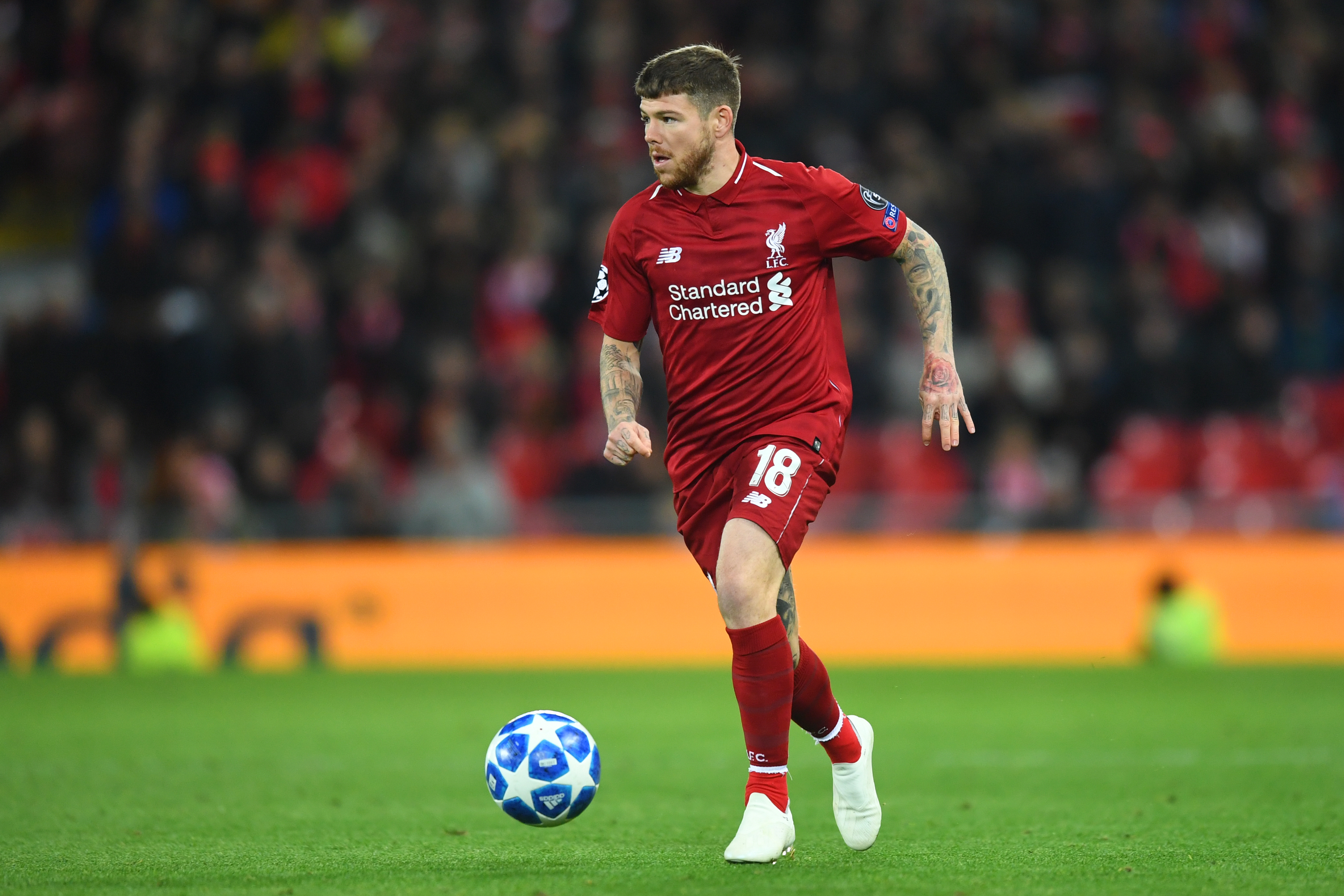 LIVERPOOL, ENGLAND - OCTOBER 24:  Alberto Moreno of Liverpool in action during the Group C match of the UEFA Champions League between Liverpool and FK Crvena Zvezda at Anfield on October 24, 2018 in Liverpool, United Kingdom.  (Photo by Michael Regan/Getty Images)