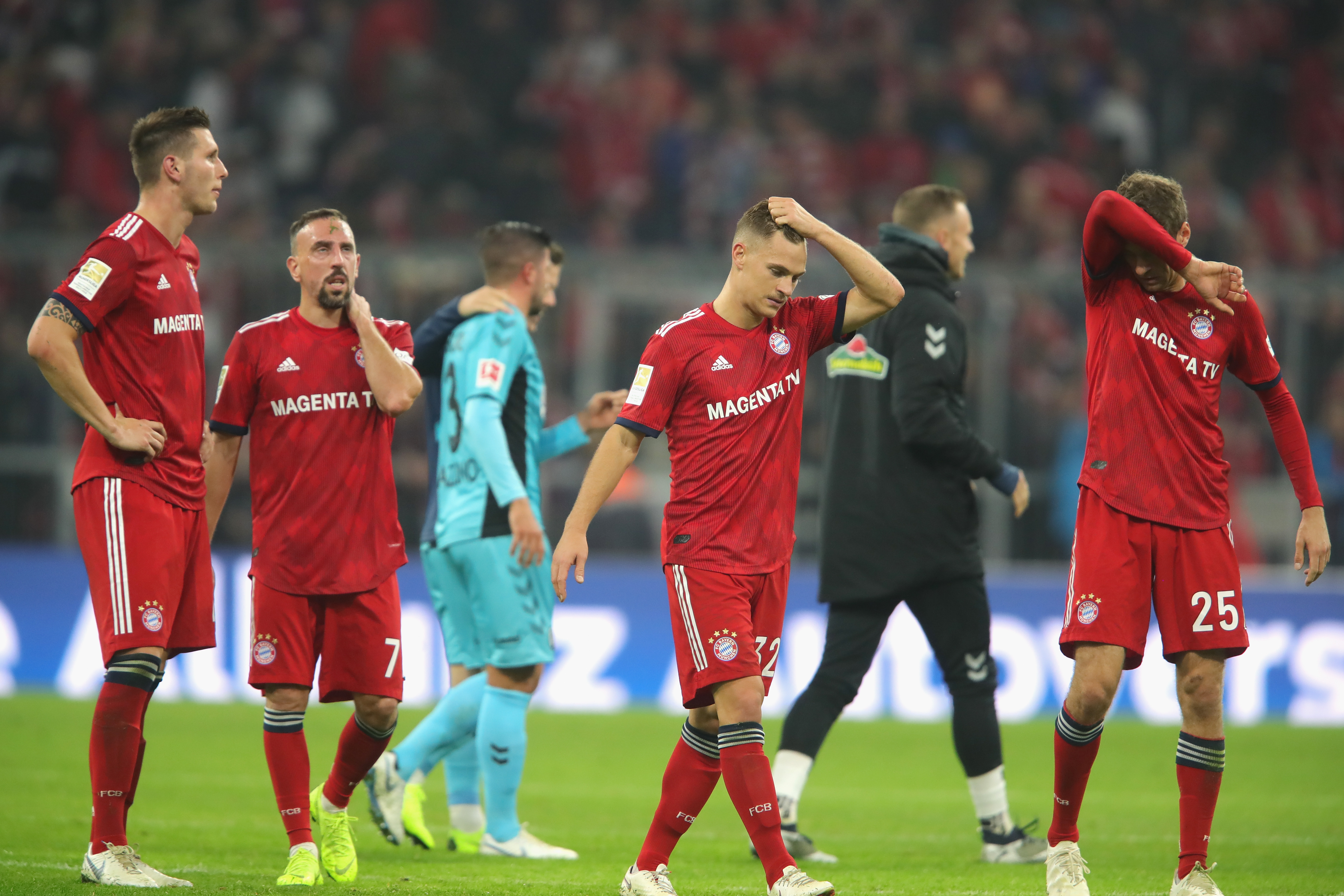 MUNICH, GERMANY - NOVEMBER 03:  (L-R) Niklas Suele, Franck Ribery, Joshua Kimmich and Thomas Mueller of Bayern Muenchen look dejected  after the Bundesliga match between FC Bayern Muenchen and Sport-Club Freiburg at Allianz Arena on November 3, 2018 in Munich, Germany.  (Photo by Alexander Hassenstein/Bongarts/Getty Images)